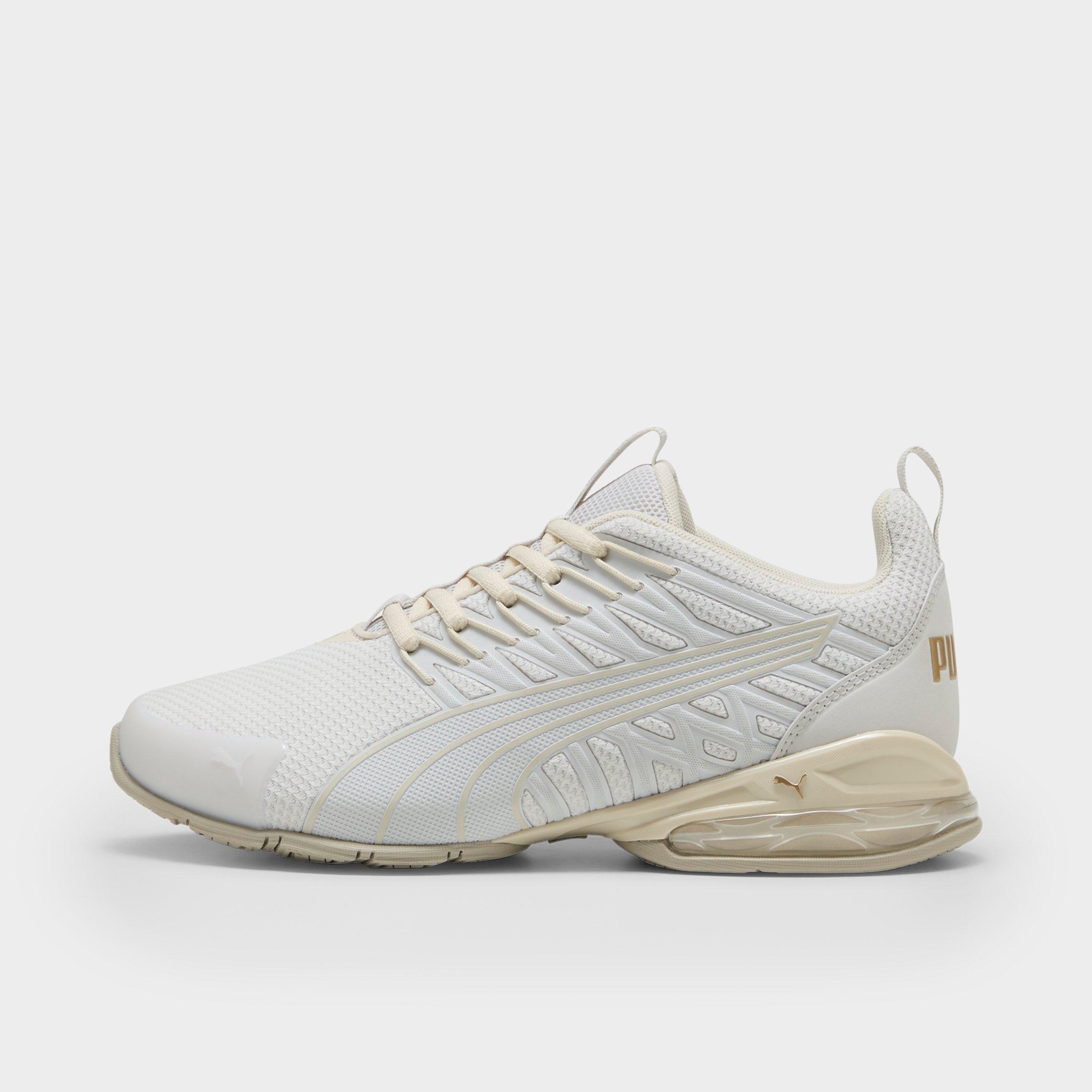 PUMA Women's VOLTAIC EVO WNS in Feather Gray/Puma Gold Size: 5.5