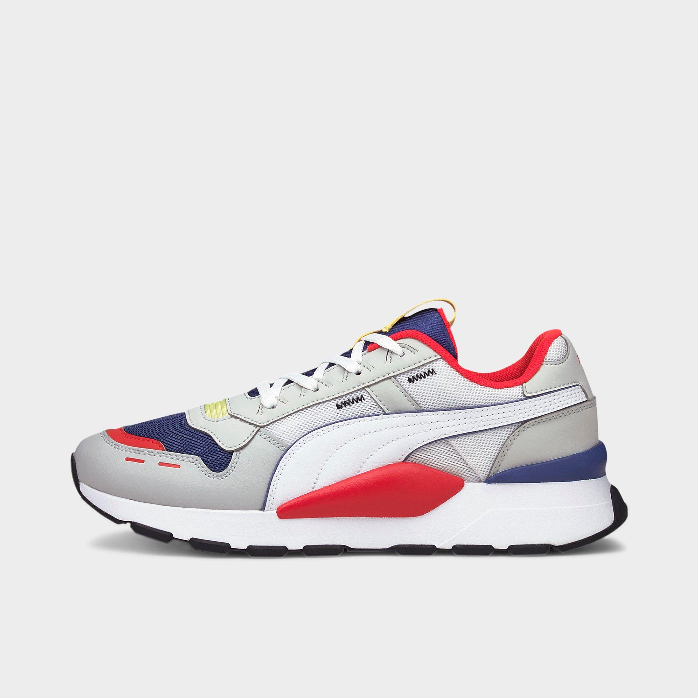 puma defy trainers white