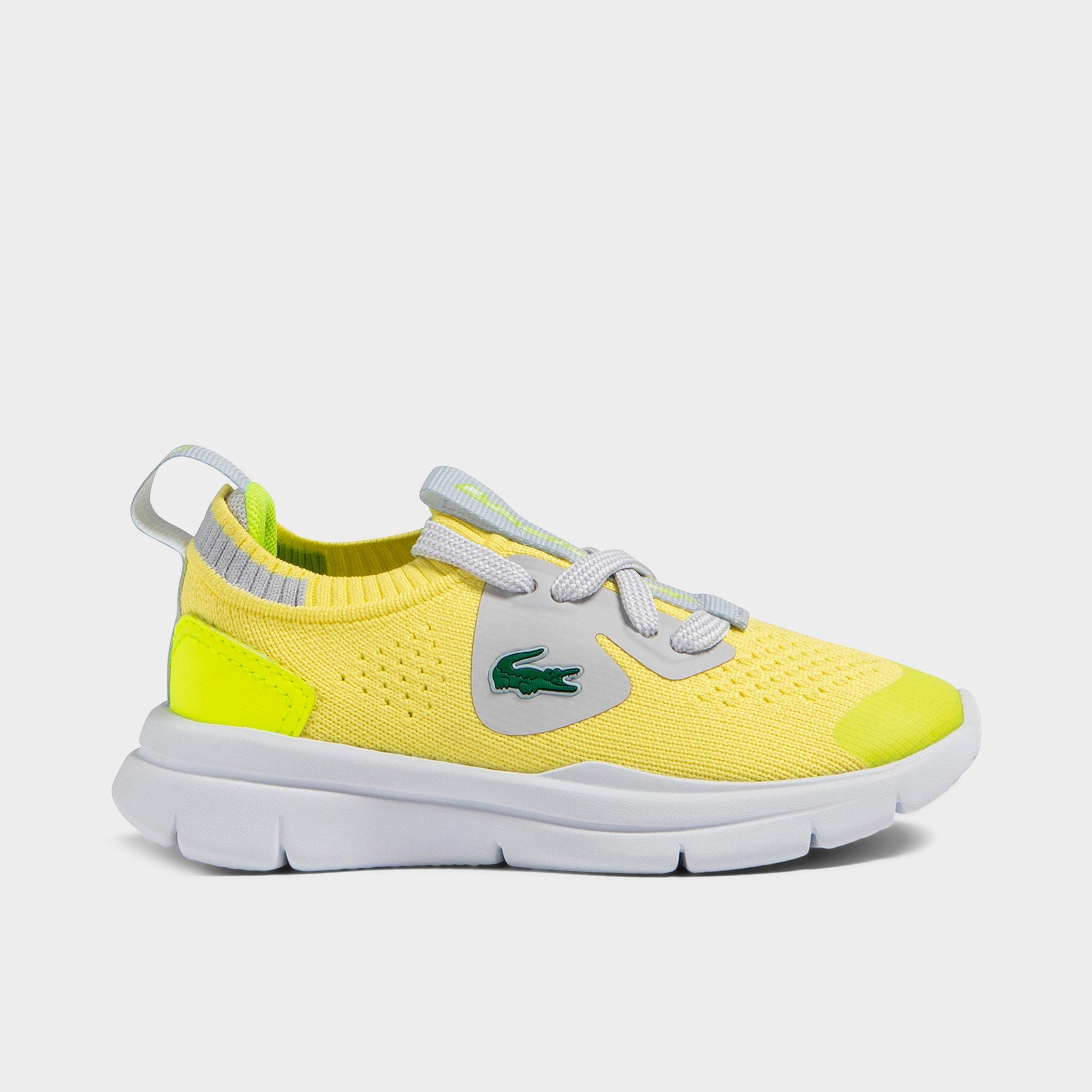 Lacoste Big Kids Run Spin Knit Casual Shoes in Dark Yellow Size: 4.0