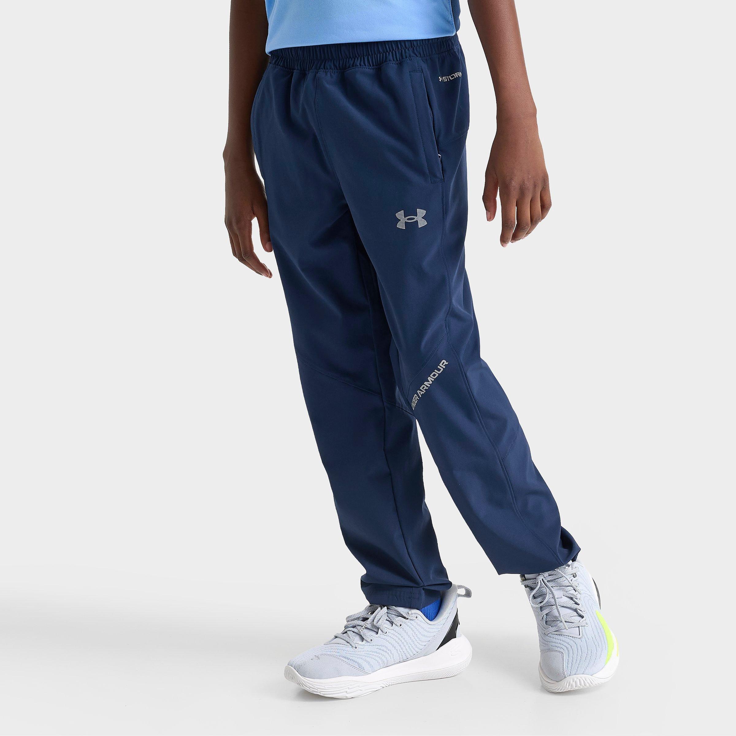 Under Armour Big Kids Tech Hybrid Woven Track Pants in Academy/Reflective Size: Small