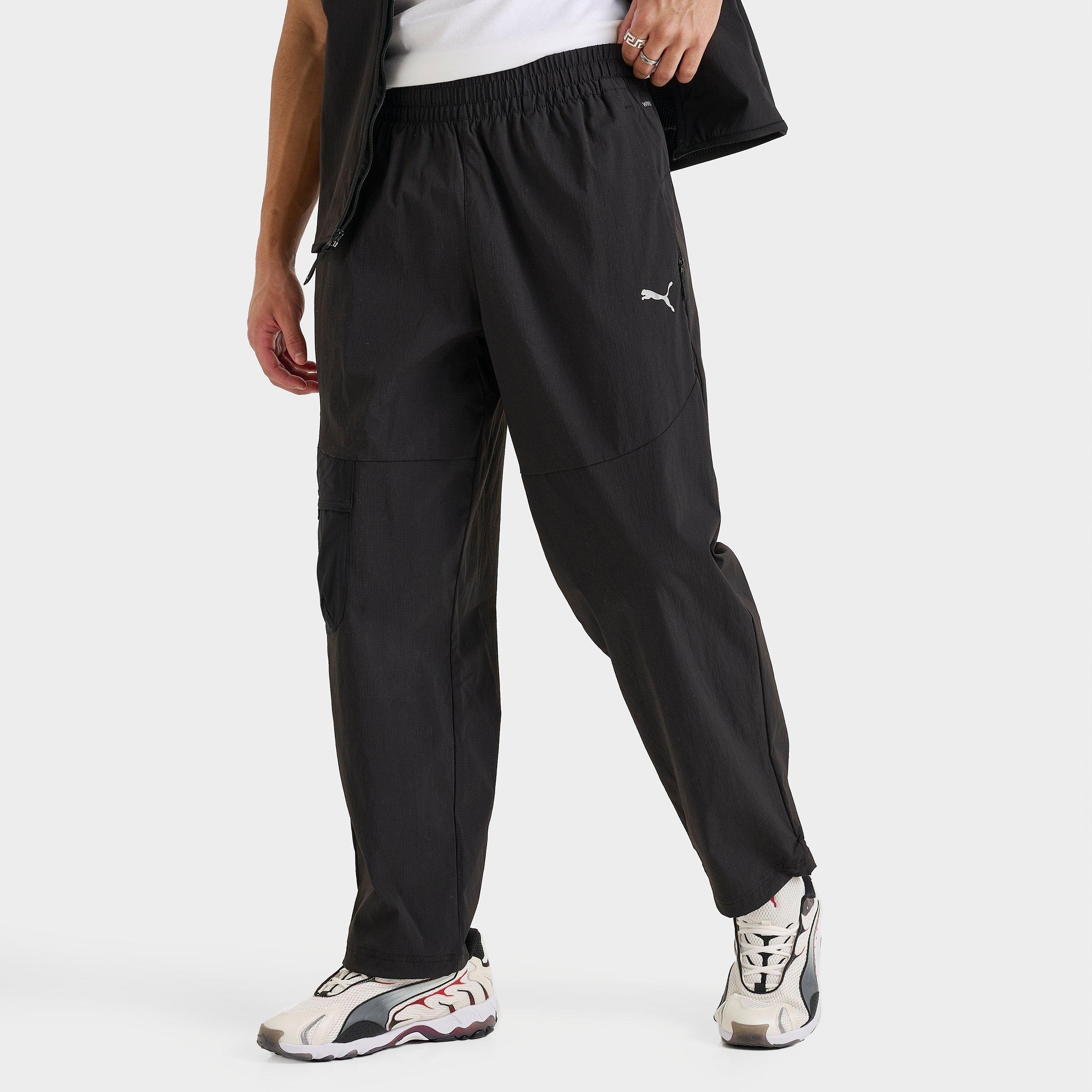 Men's Puma TECH Relaxed Woven Cargo Pants in Puma Black Size: Small