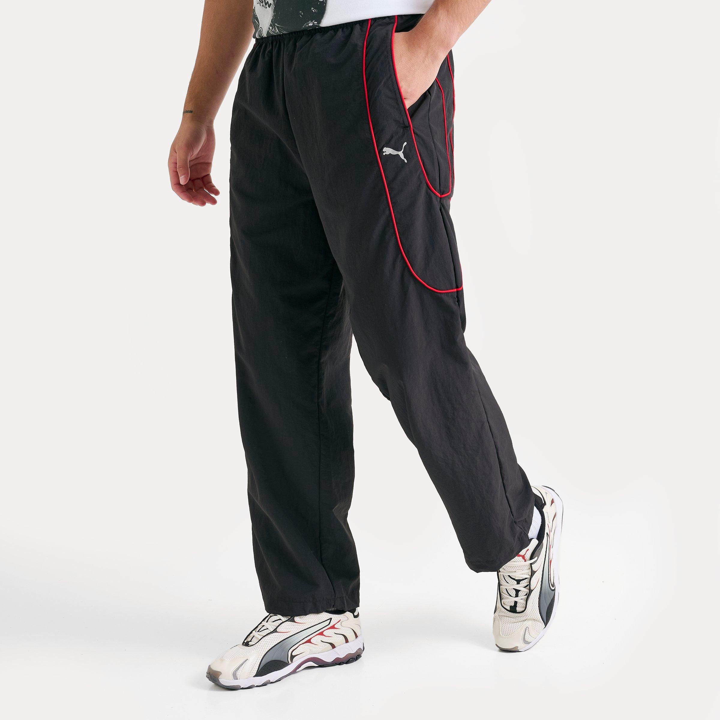 Men's Puma TECH-X Relaxed Track Pants in Puma Black/For All Time Red Size: Small