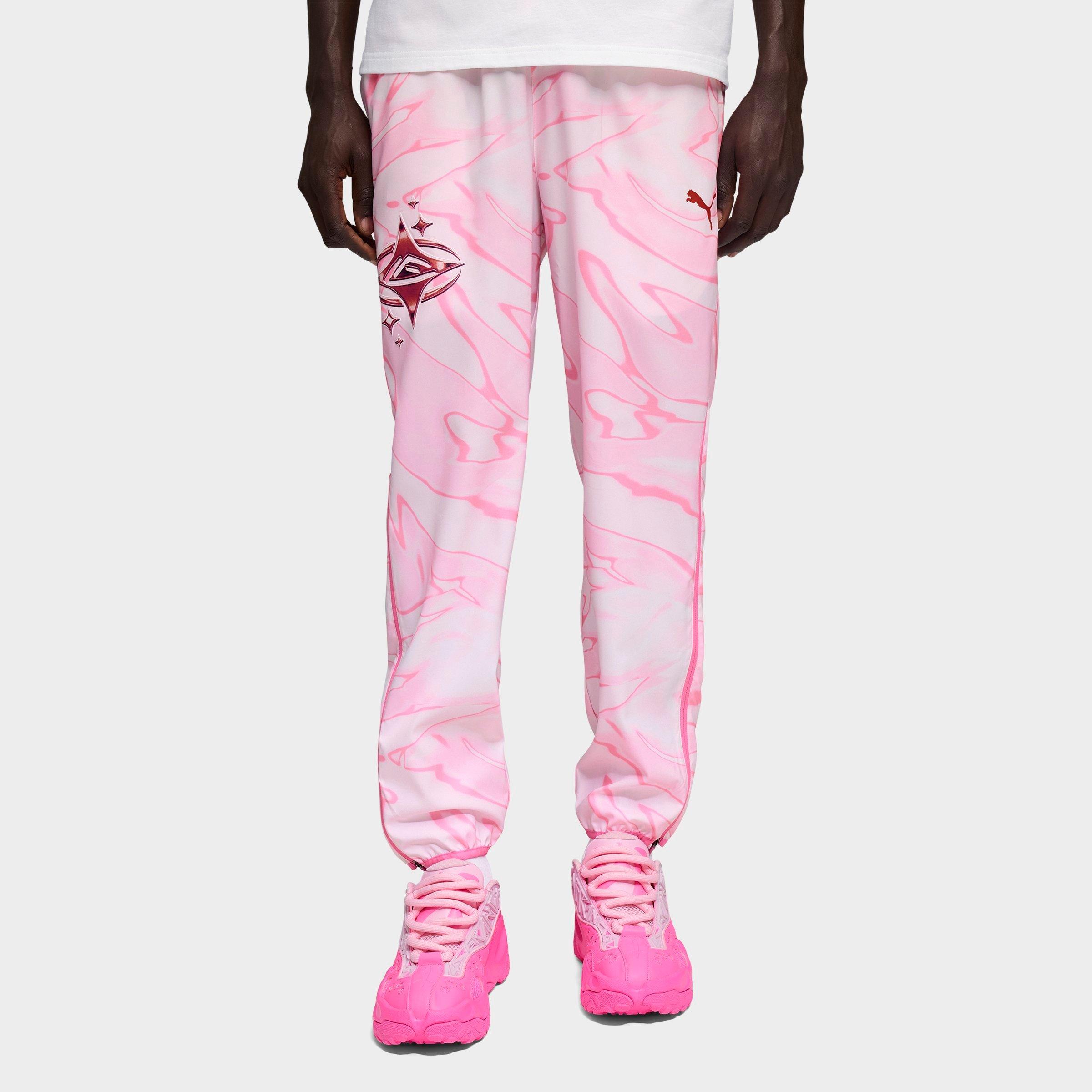 Men's Puma LaFrancé Pink Heem Graphic Track Pants in Pale Pink/Allover Print Size: Large