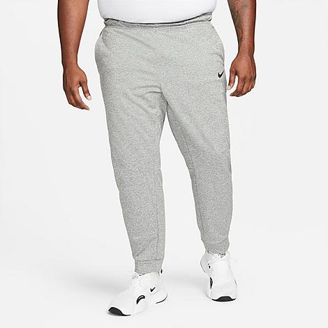 UPC 191884005837 product image for Nike Men's Therma-FIT Tapered Sweatpants in Grey/Dark Grey Heather Size 4XLT 100 | upcitemdb.com