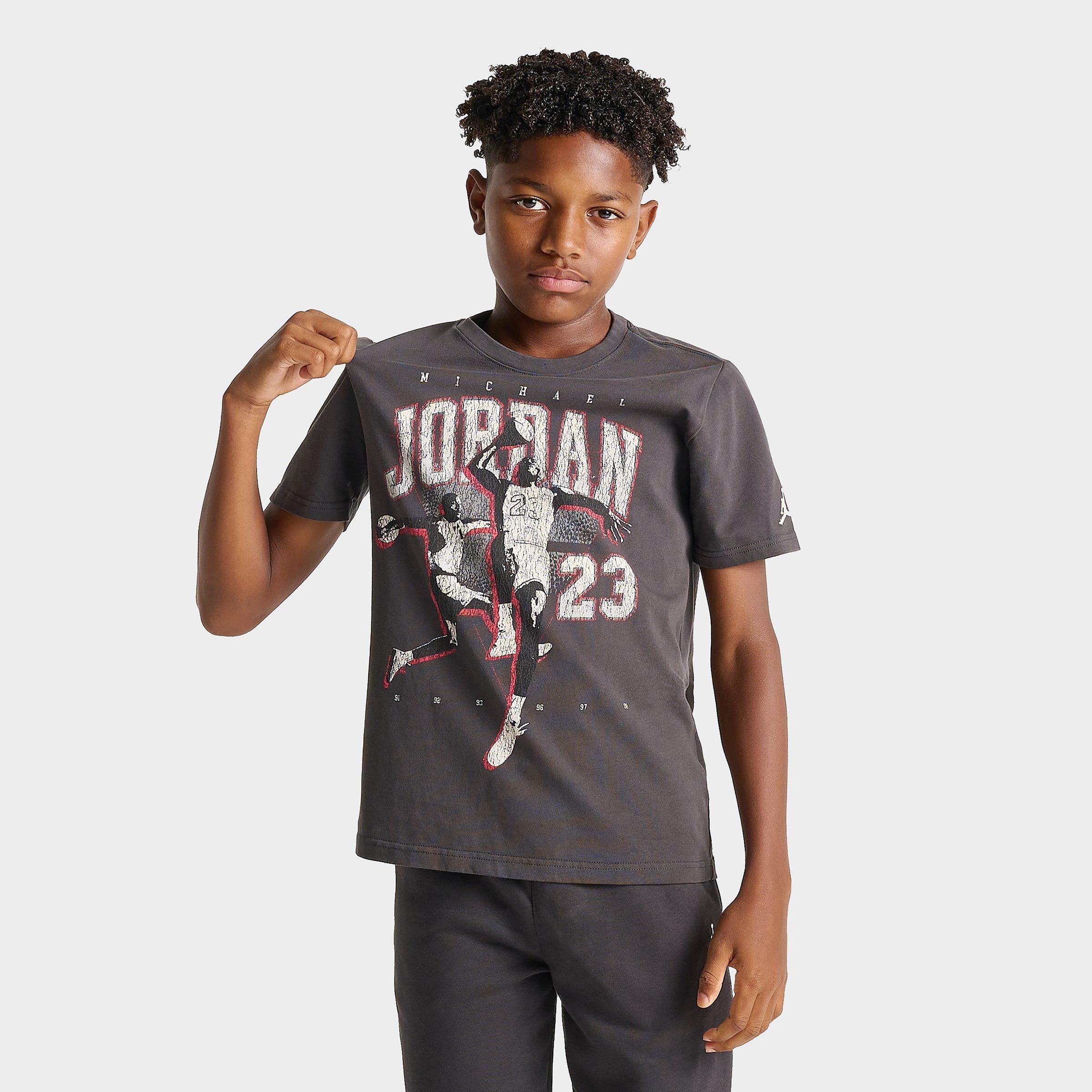 Jordan Big Kids Legend of Flight T-Shirt in Off Noir Size: Small