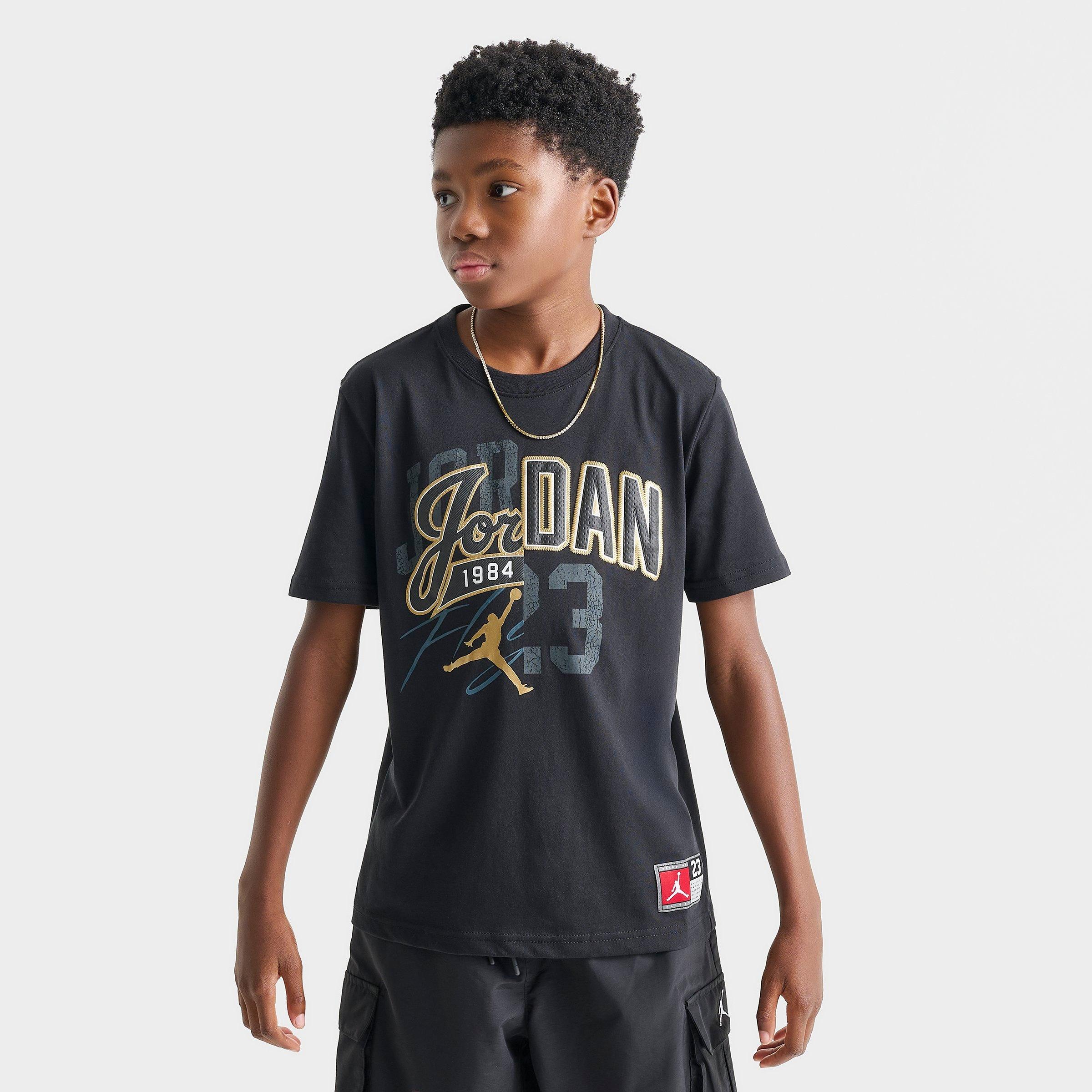 Jordan Big Kids Varsity Split T-Shirt in Black/Metallic Gold Size: Small