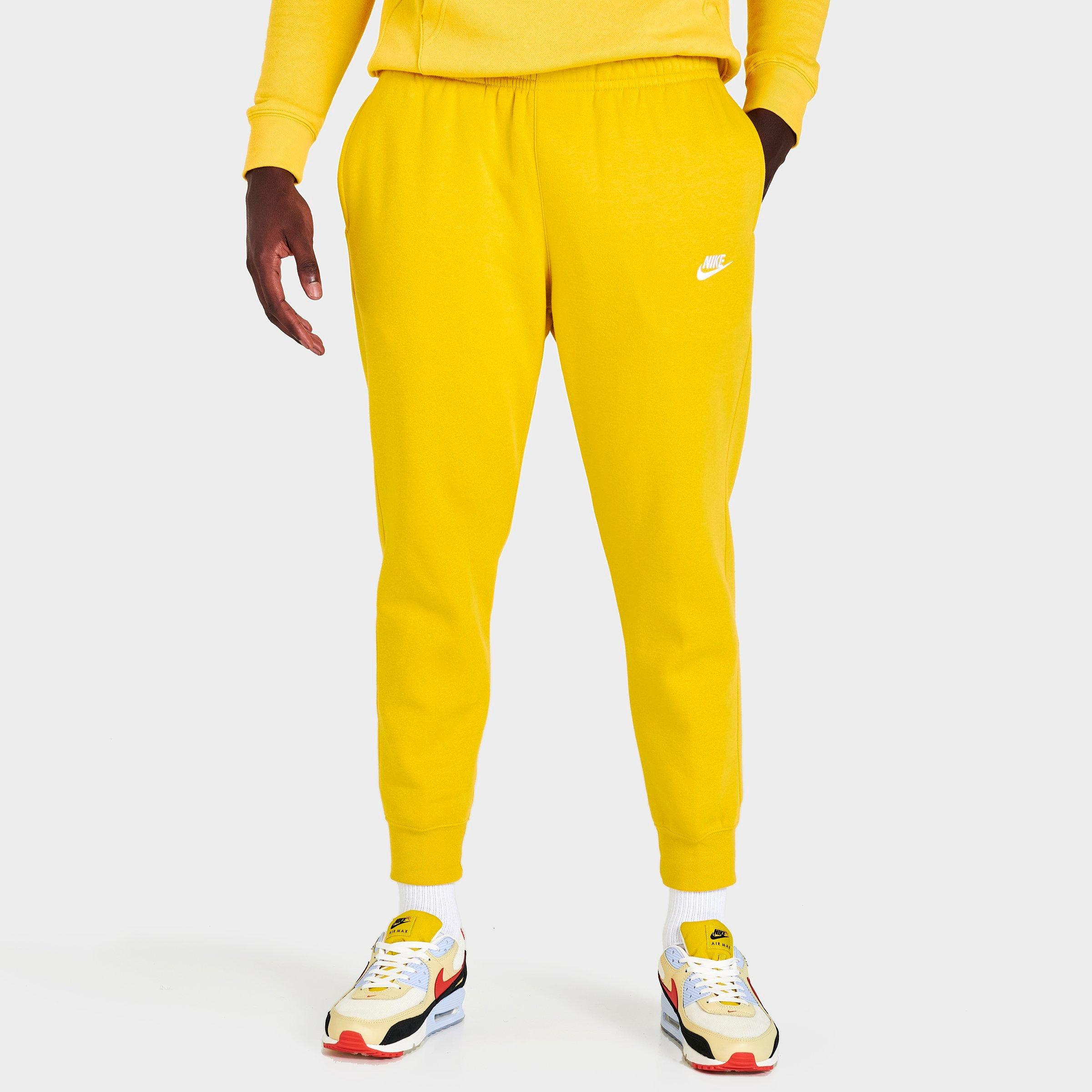nike men's sportswear club fleece joggers yellow