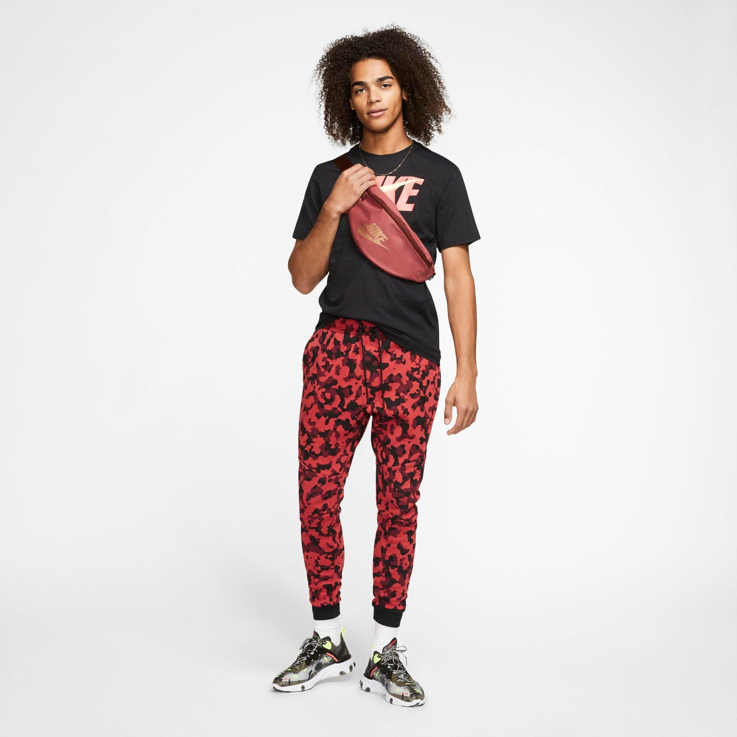 nike sportswear all over print track pants