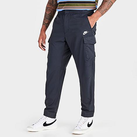 Nike Men's Sportswear Tech Essentials Unlined Commuter Pants In Black/white | ModeSens