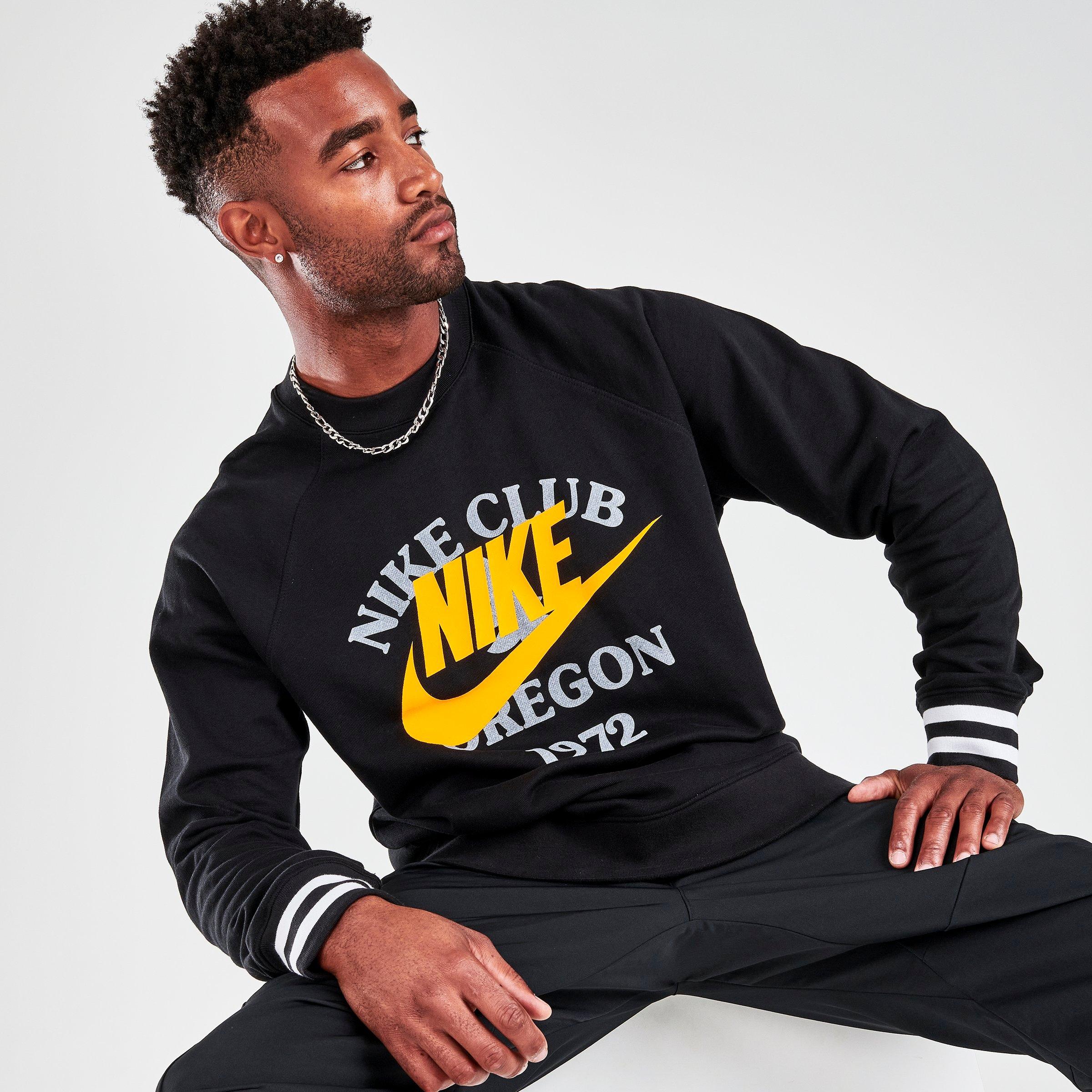 UPC 195239015021 product image for Nike Men's Sportswear Stacked Prints French Terry Crewneck Sweatshirt in Black/B | upcitemdb.com