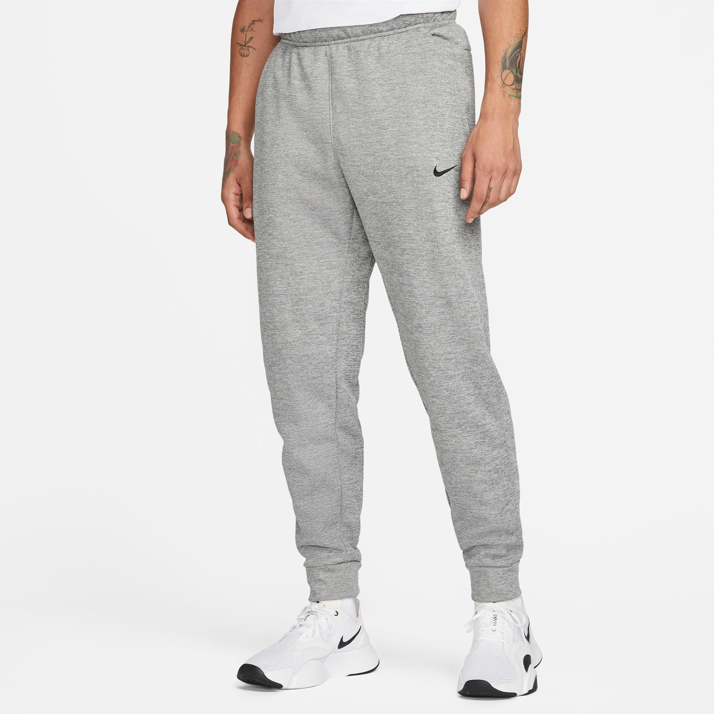 Nike Men's Therma-FIT Tapered Fitness Sweatpants in Dark Grey Heather/Particle Grey/Black Size: Small