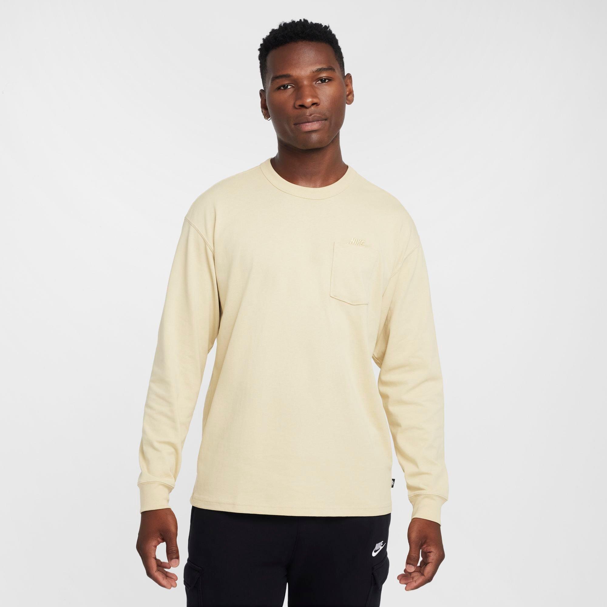 Nike Men's Sportswear Premium Essentials Long-Sleeve Pocket T-Shirt in Team Gold Size: XS