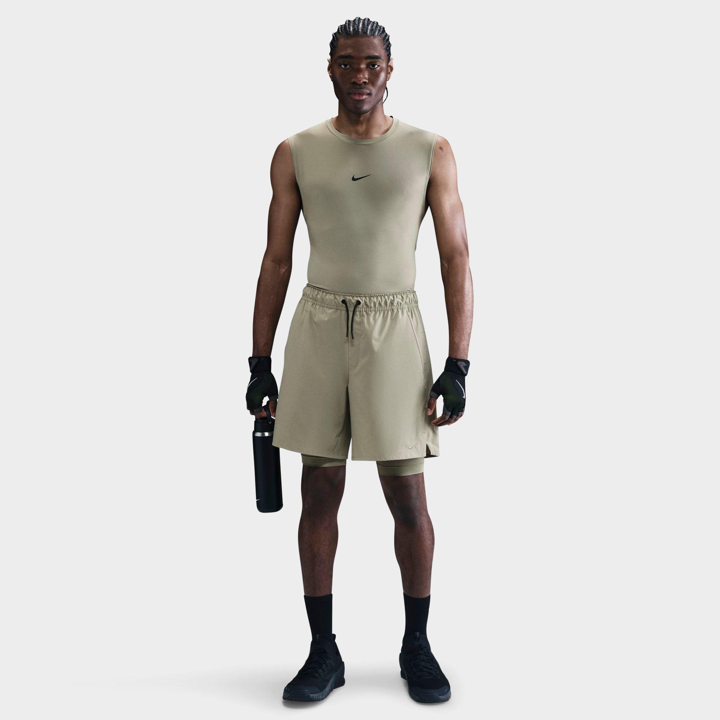 Nike Men's Unlimited Dri-FIT 2-in-1 7" Versatile Shorts in Light Army/Light Army/Black Size: XS