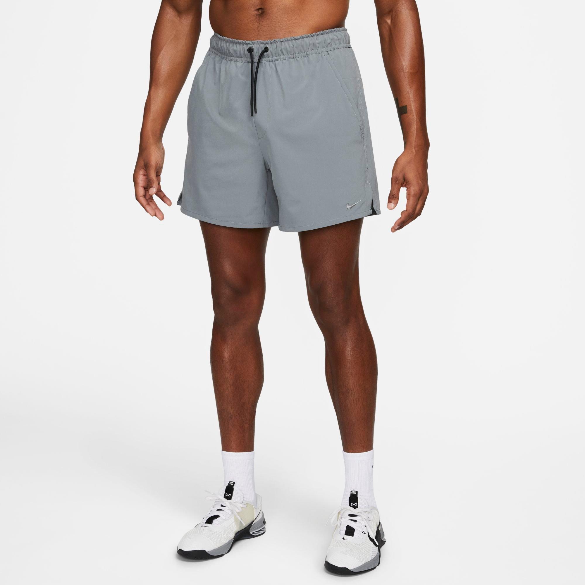 Shop Nike Men's Unlimited Dri-fit 5" Unlined Versatile Shorts In Smoke Grey/black/smoke Grey