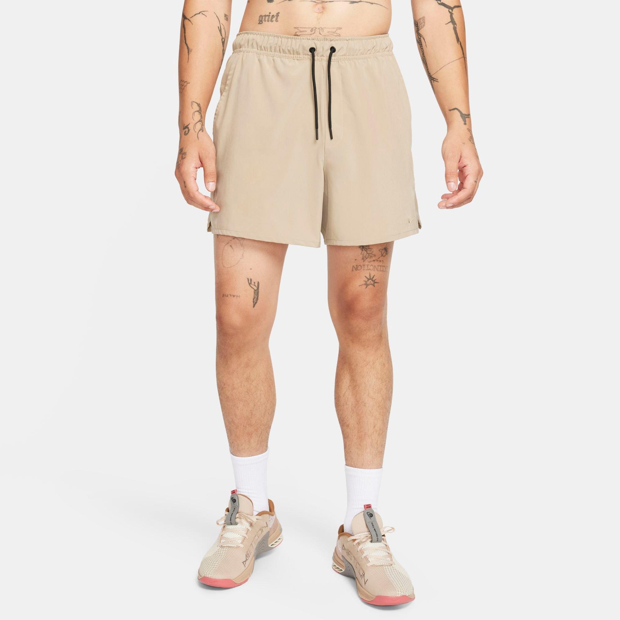 Shop Nike Men's Unlimited Dri-fit 5" Unlined Versatile Shorts In Khaki/black/khaki