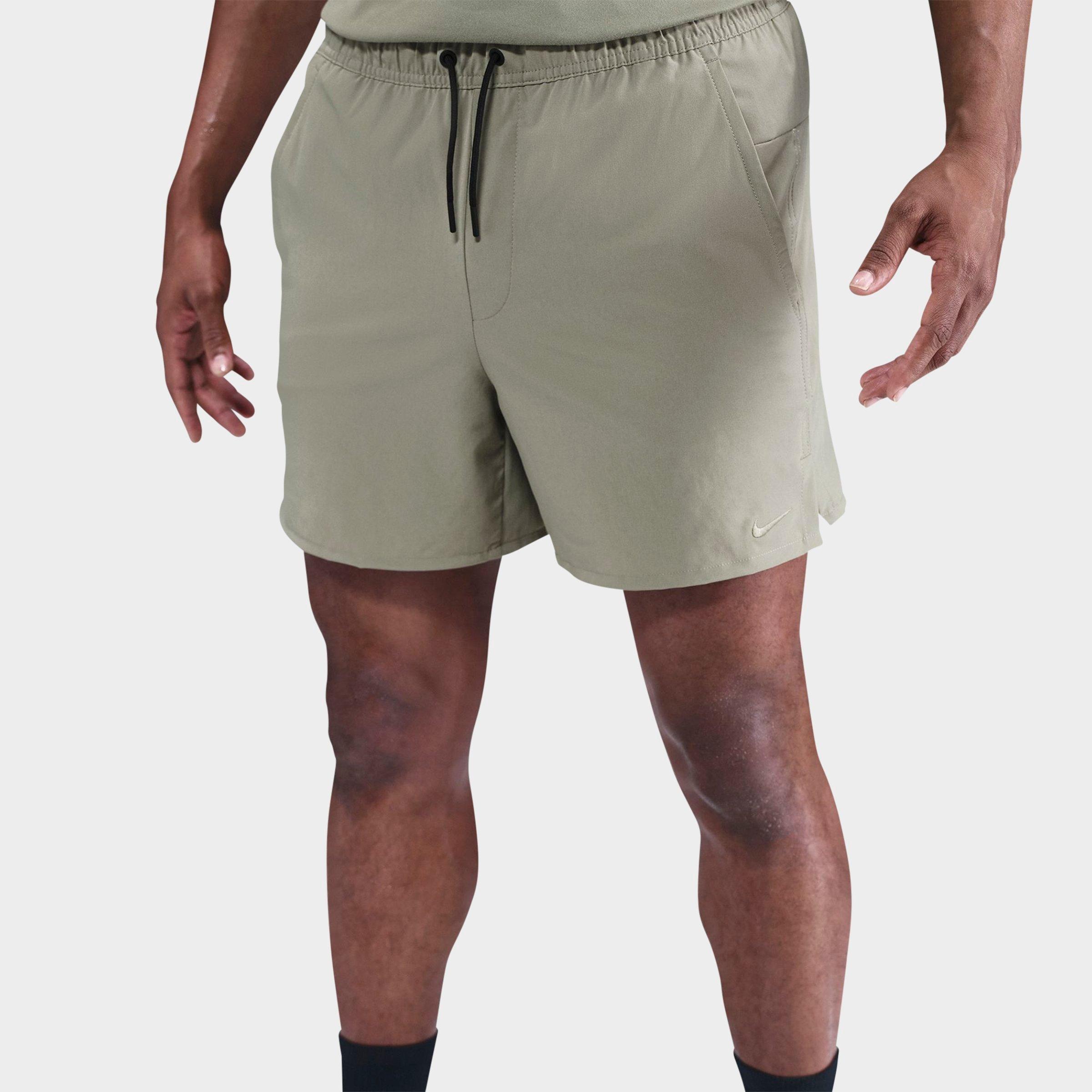 Nike Men's Unlimited Dri-FIT 5" Unlined Versatile Shorts in Green/Light Army Size Medium Polyester/Spandex