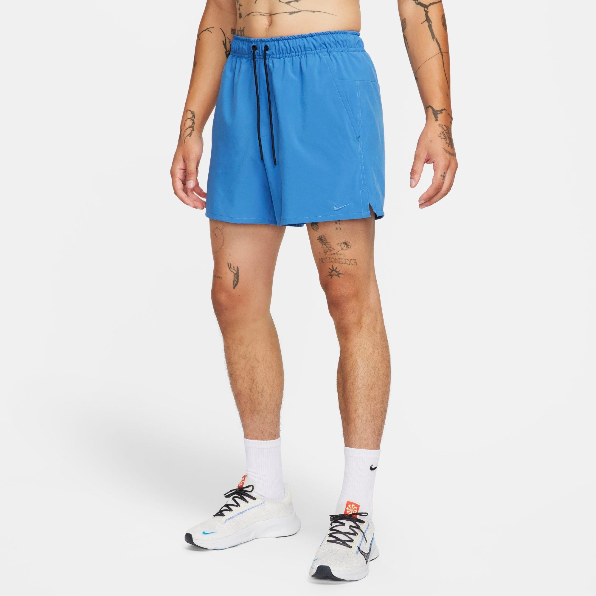 Shop Nike Men's Unlimited Dri-fit 5" Unlined Versatile Shorts In Star Blue/black/star Blue
