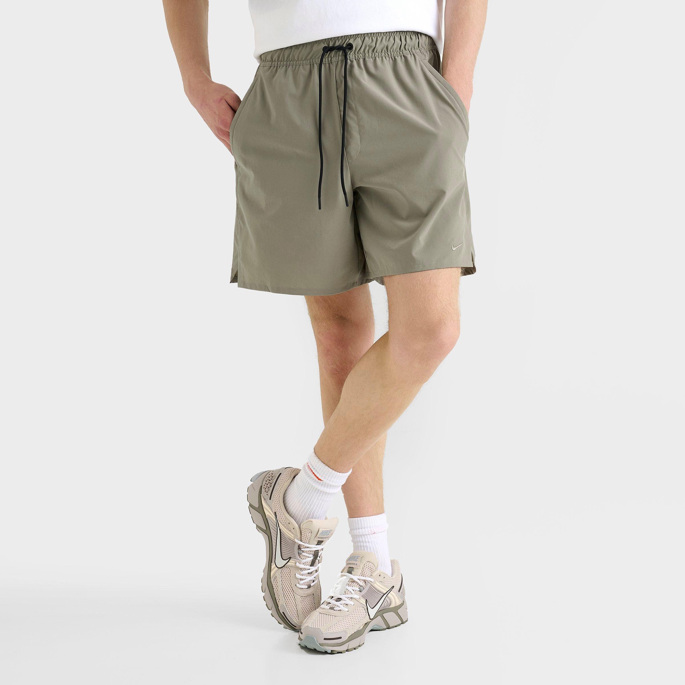Nike Men's Unlimited Dri-FIT 7" Unlined Versatile Shorts in Green/Light Army Size Small Polyester/Spandex