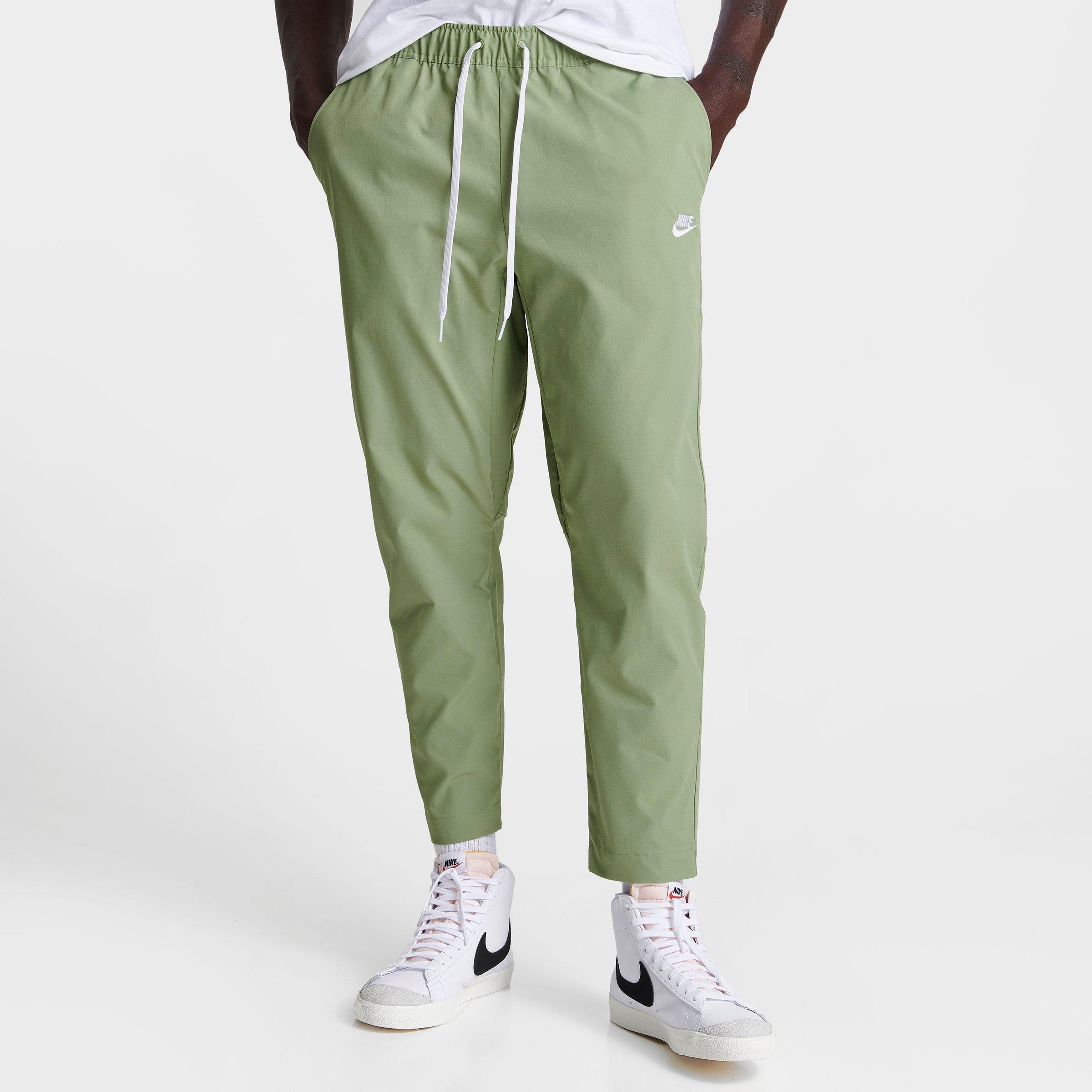 Nike Men's Club Woven Tapered Leg Pants In Oil Green/white