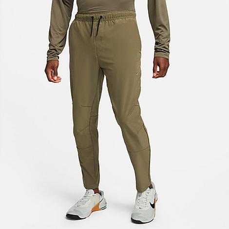 Shop Nike Men's Unlimited Dri-fit Straight Leg Versatile Pants In Medium Olive/black