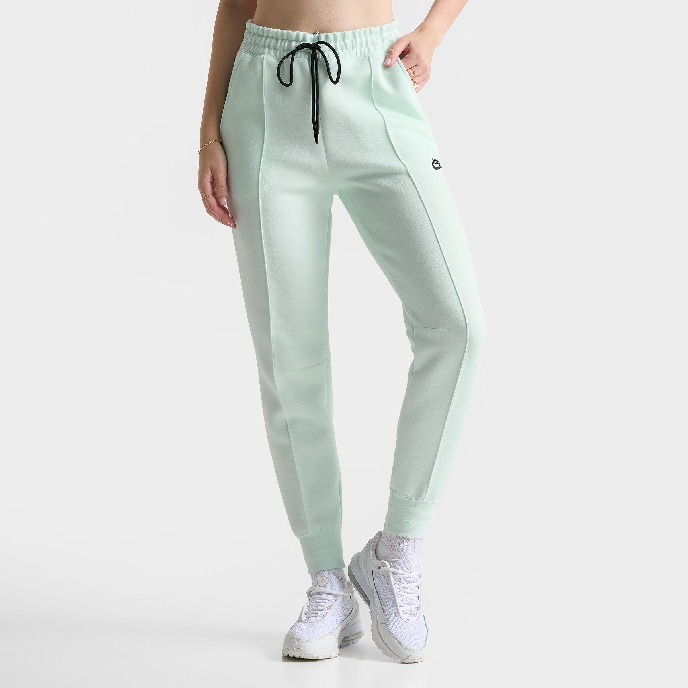 Shop Nike Women's Sportswear Tech Fleece Jogger Pants In Barely Green/black