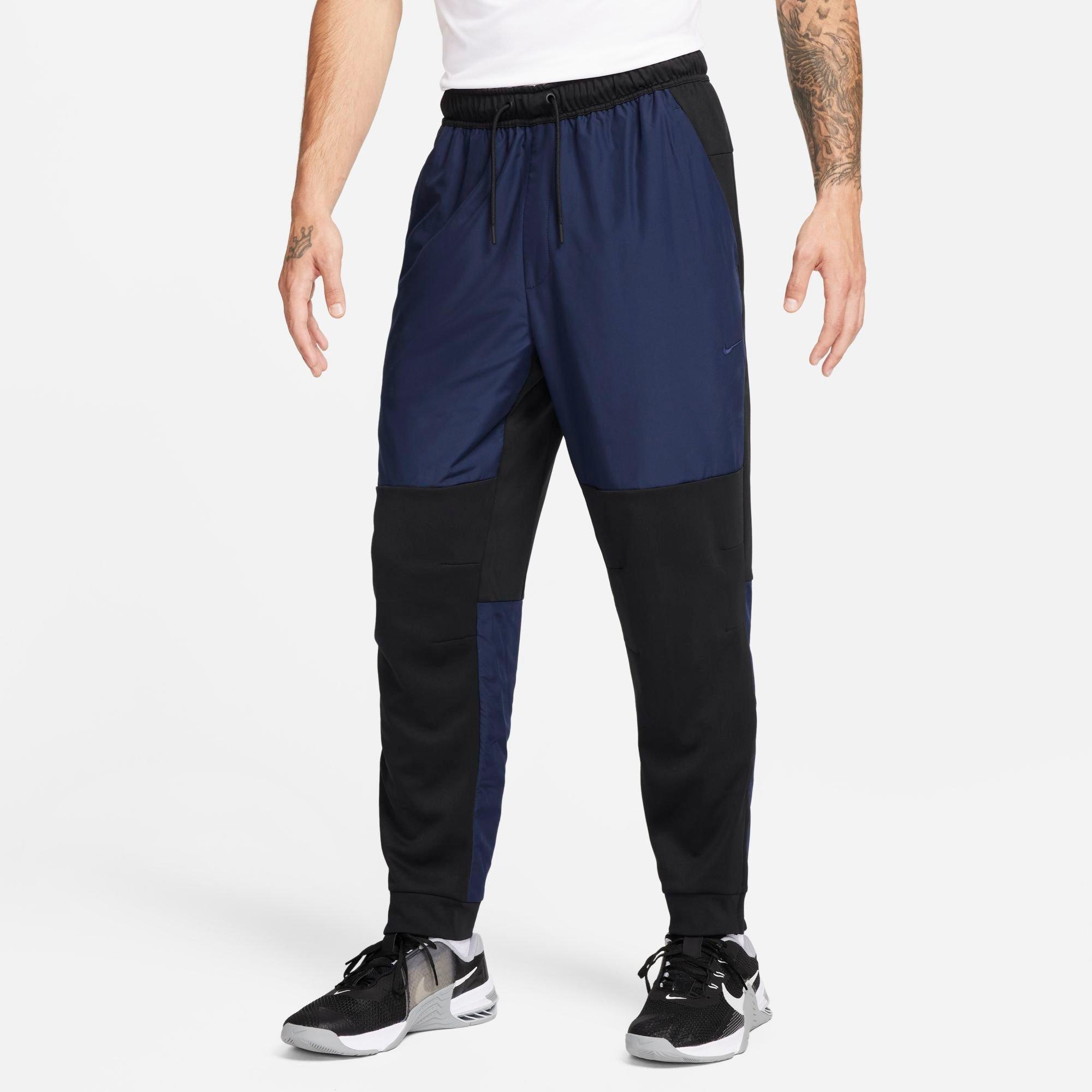 Nike Men's Unlimited Water-repellent Tapered Versatile Pants In Black/obsidian
