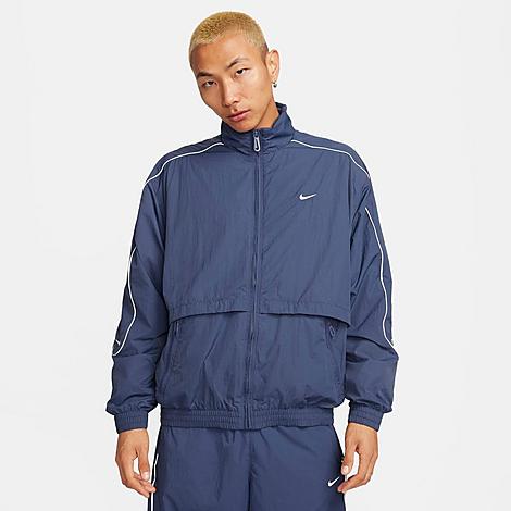 Shop Nike Men's Sportswear Solo Swoosh Woven Track Jacket In Thunder Blue/white