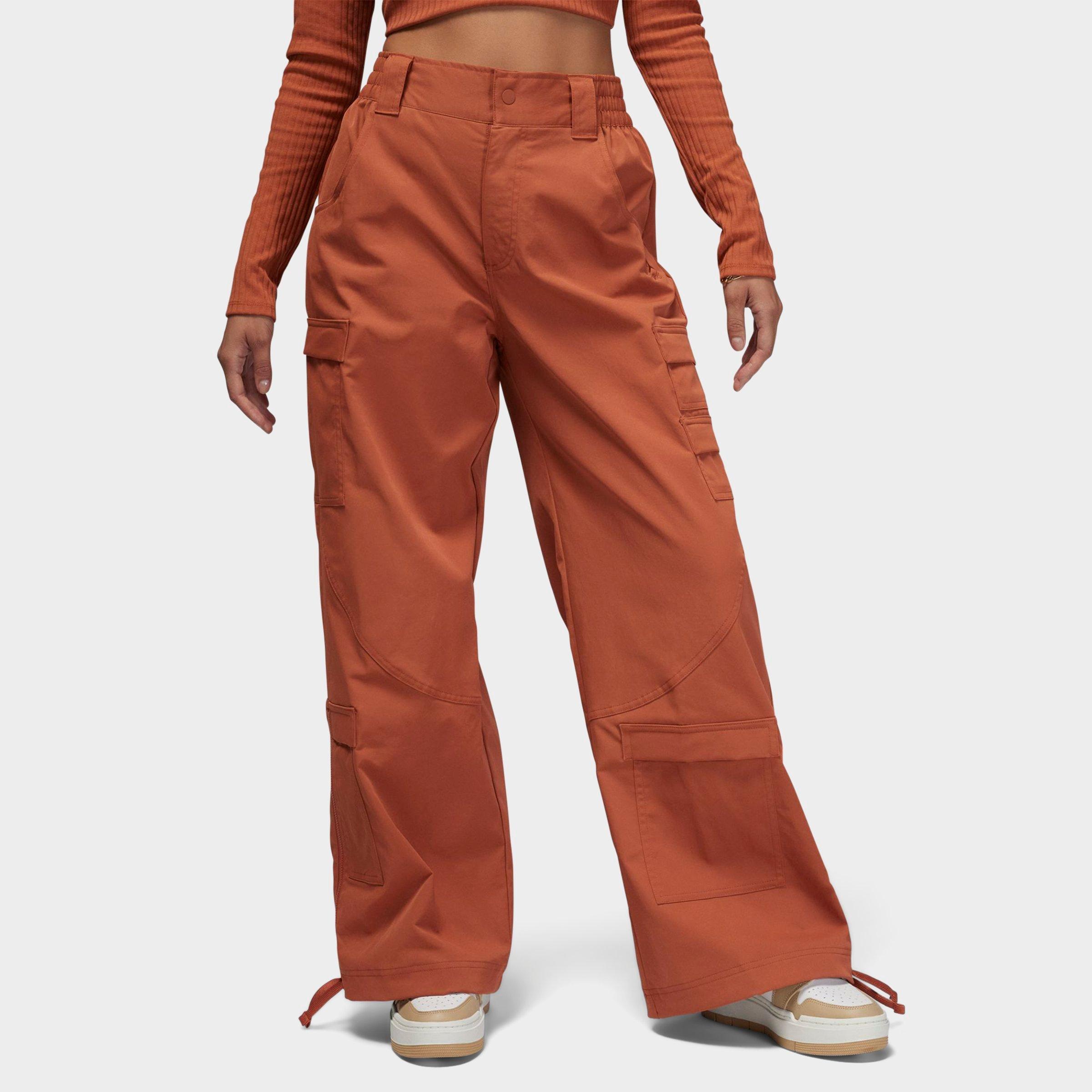 Shop Nike Jordan Women's High-waist Chicago Cargo Pants In Dusty Peach 