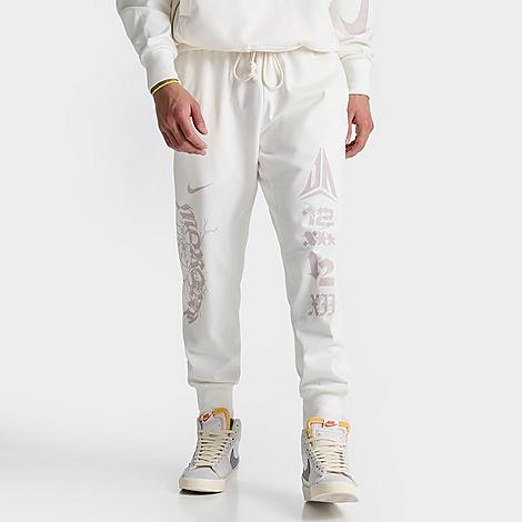 Shop Nike Men's Standard Issue Ja Logo Dri-fit Jogger Basketball Pants In Sail/platinum Violet