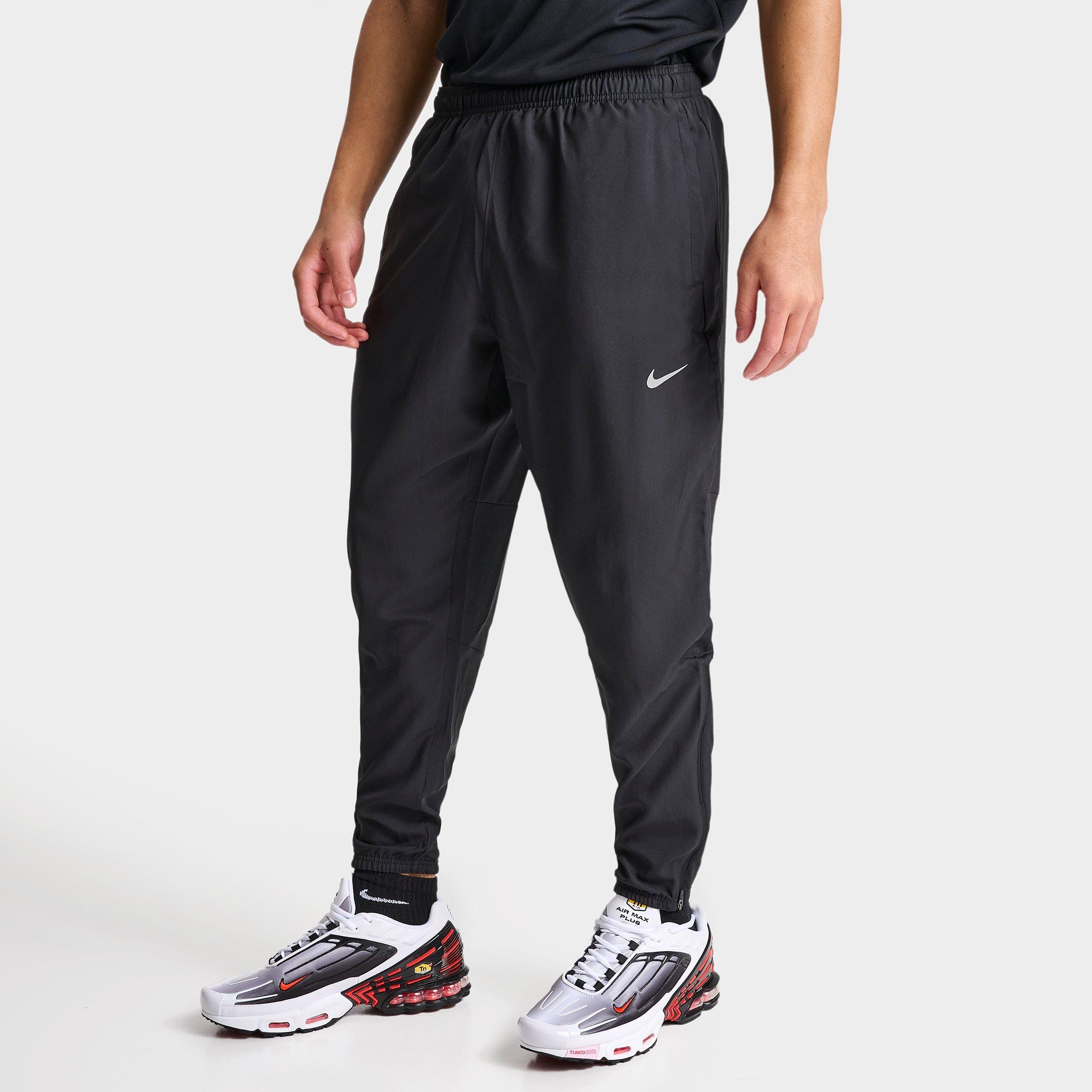 Nike Men's Challenger Dri-FIT Woven Running Pants in Black/Black Size Large Polyester