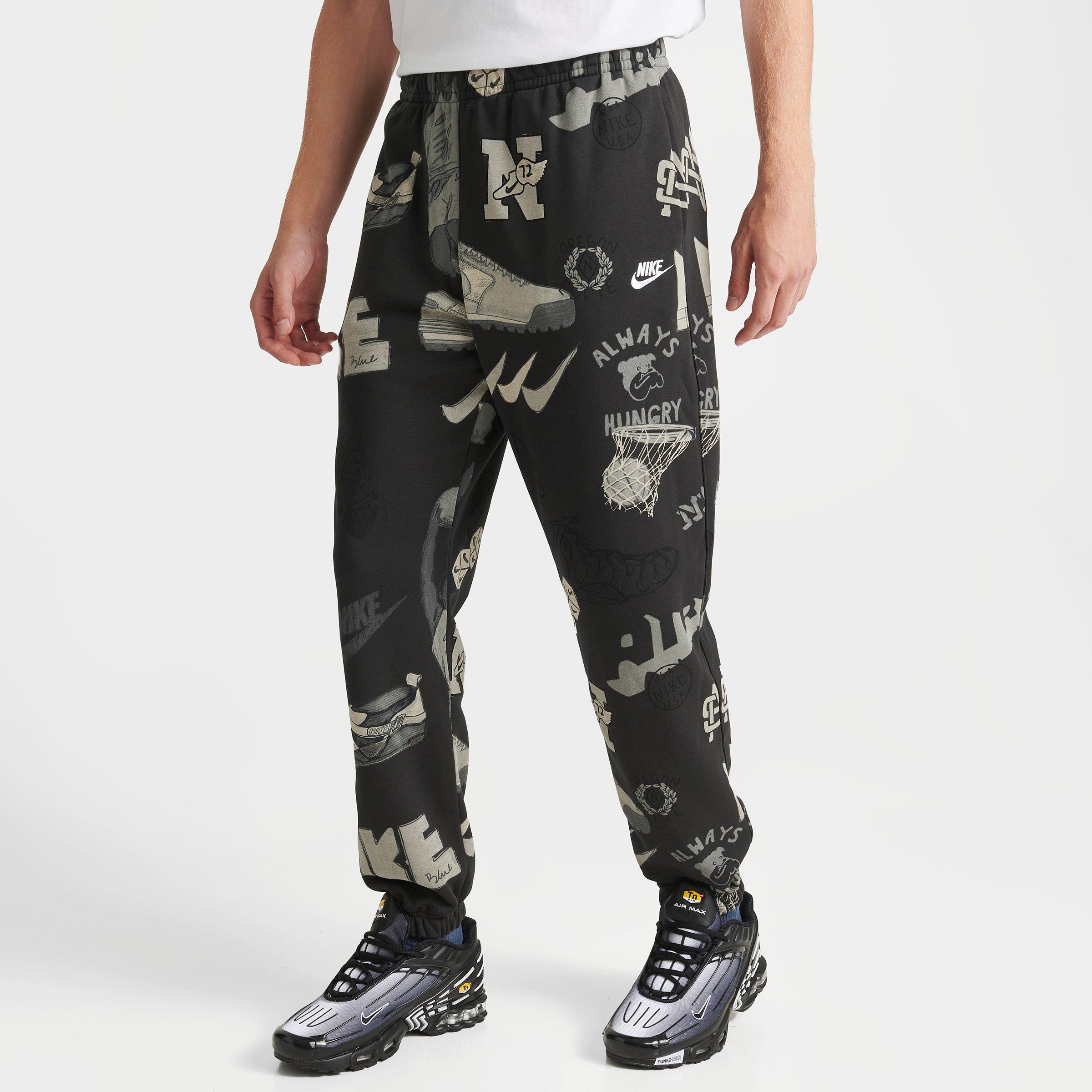Nike Men's Sportswear Club Fleece Allover Printed Jogger Pants in Off Noir Size: Small