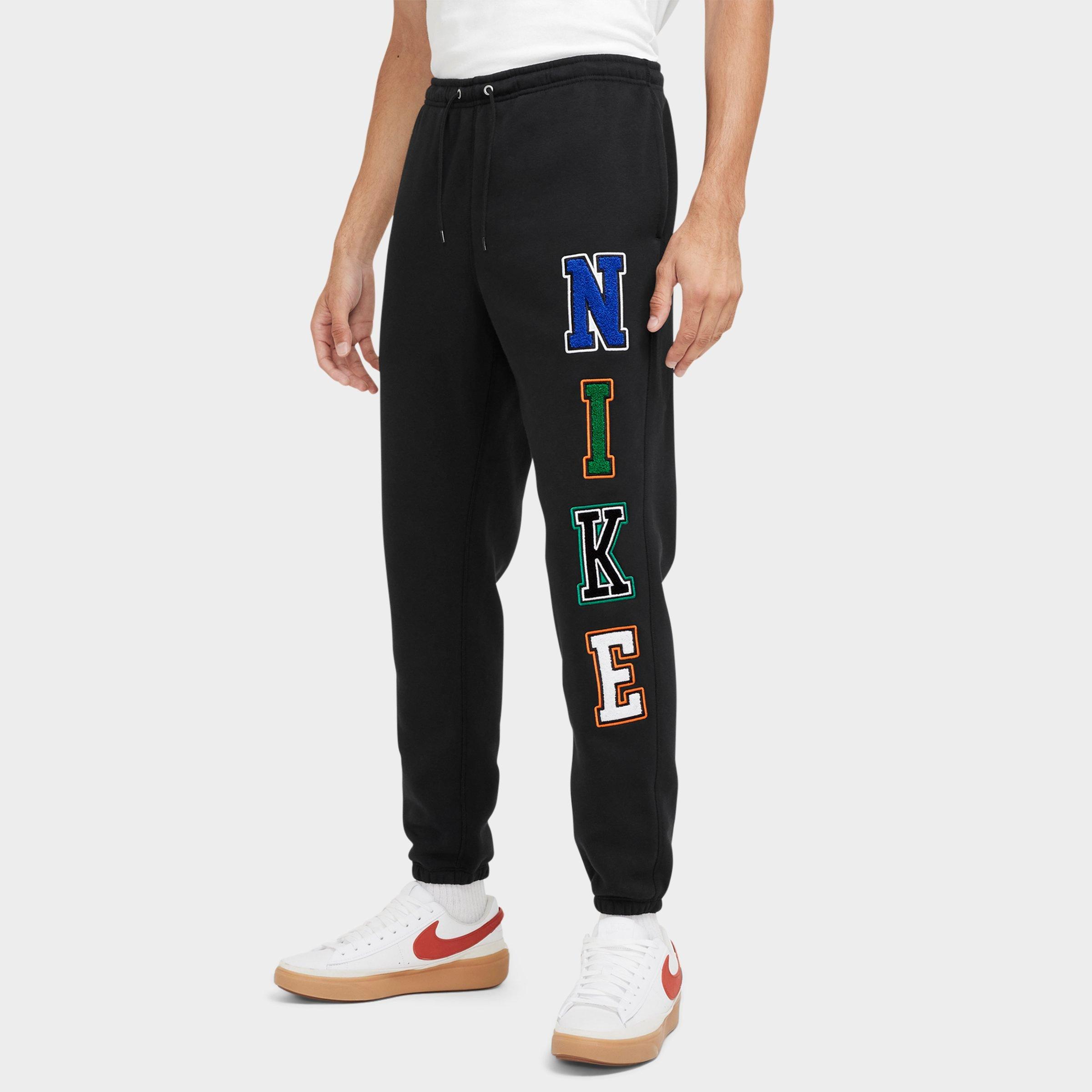 Nike Men's Sportswear Club Fleece Varsity Jogger Sweatpants in Black/Black Size XL Cotton/Polyester/Fleece