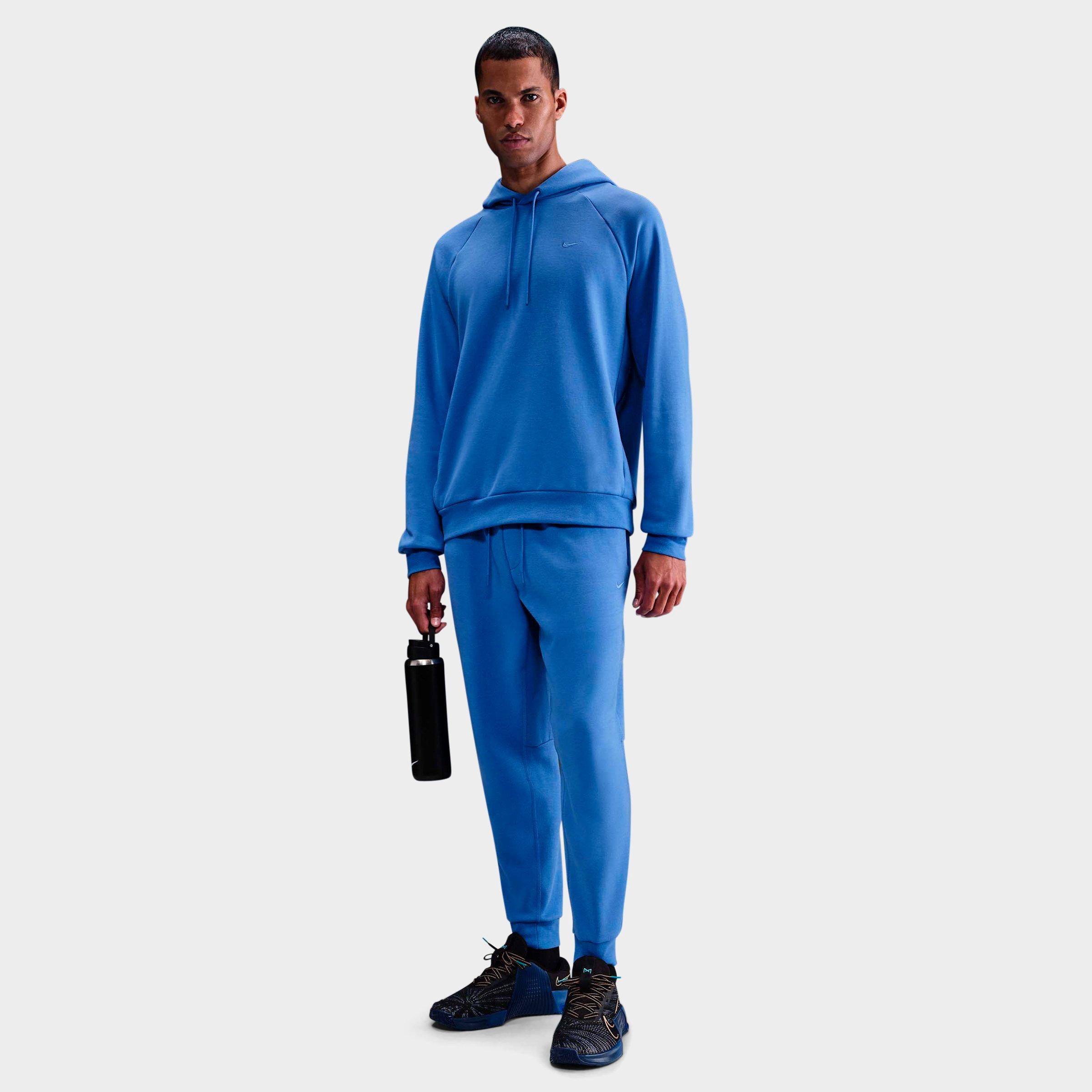Nike Men's Primary Dri-FIT UV Versatile Jogger Pants in Comet Blue/Comet Blue Size: XS