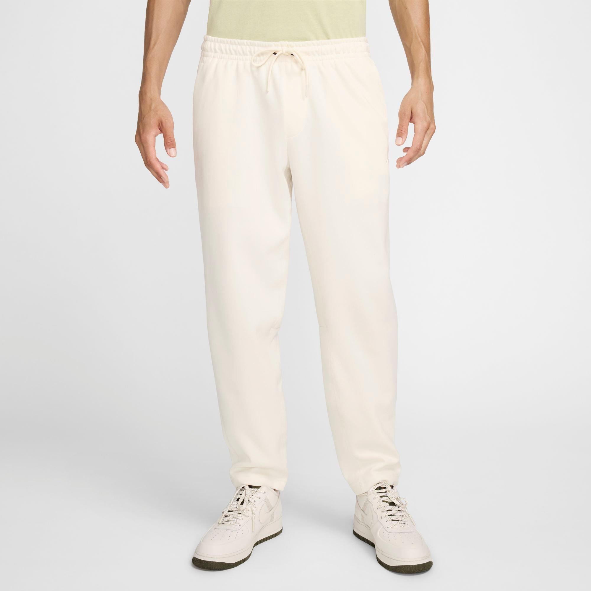 Nike Men's Primary Dri-FIT UV Tapered Versatile Pants in Pale Ivory/Pale Ivory Size: 2XS