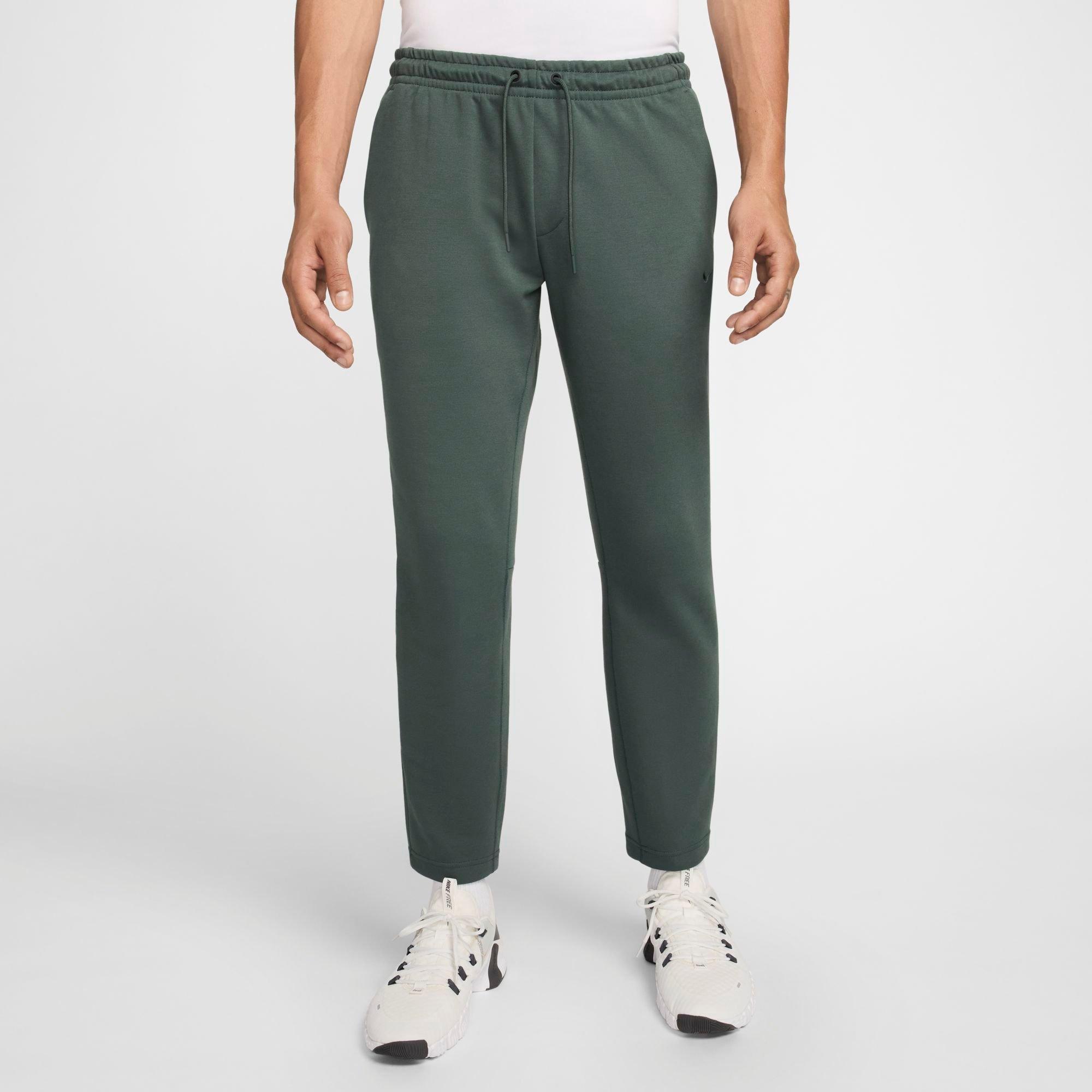 Nike Men's Primary Dri-FIT UV Tapered Versatile Pants in Vintage Green/Vintage Green Size: Large