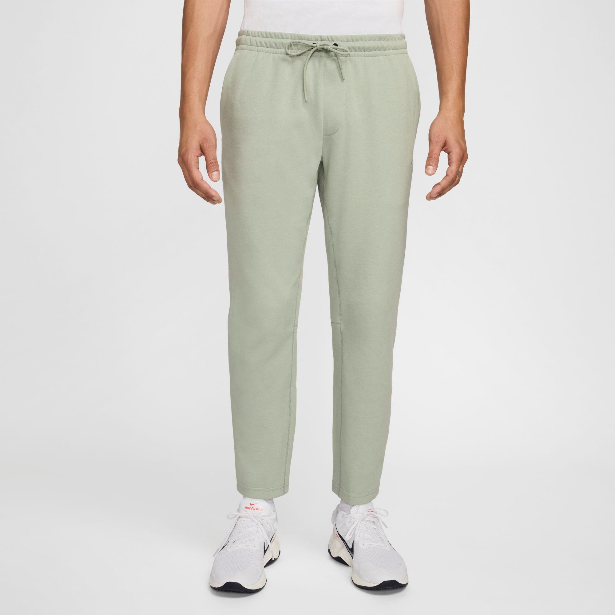 Nike Men's Primary Dri-FIT UV Tapered Versatile Pants in Jade Horizon/Jade Horizon Size: 2XS