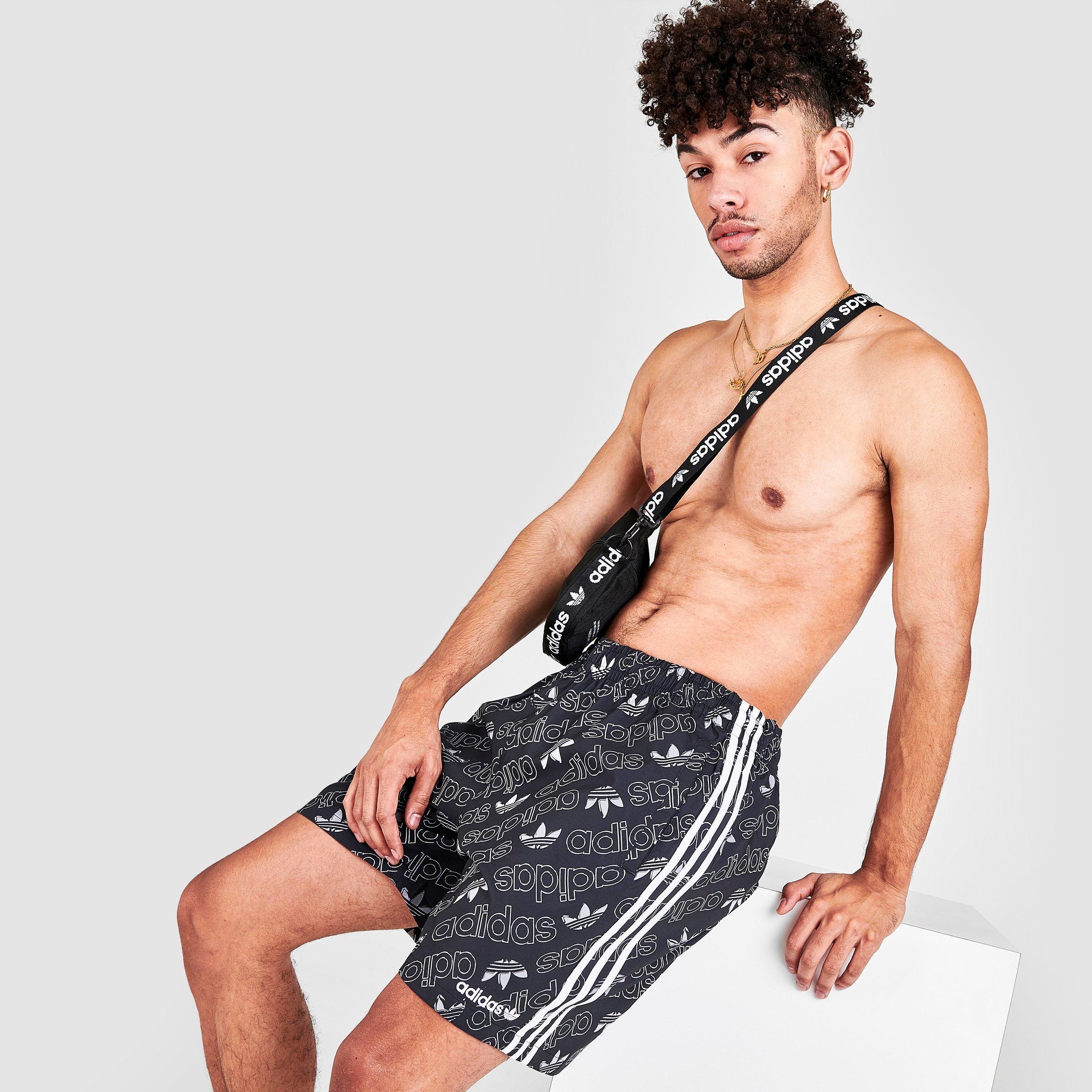 adidas allover print swim shorts