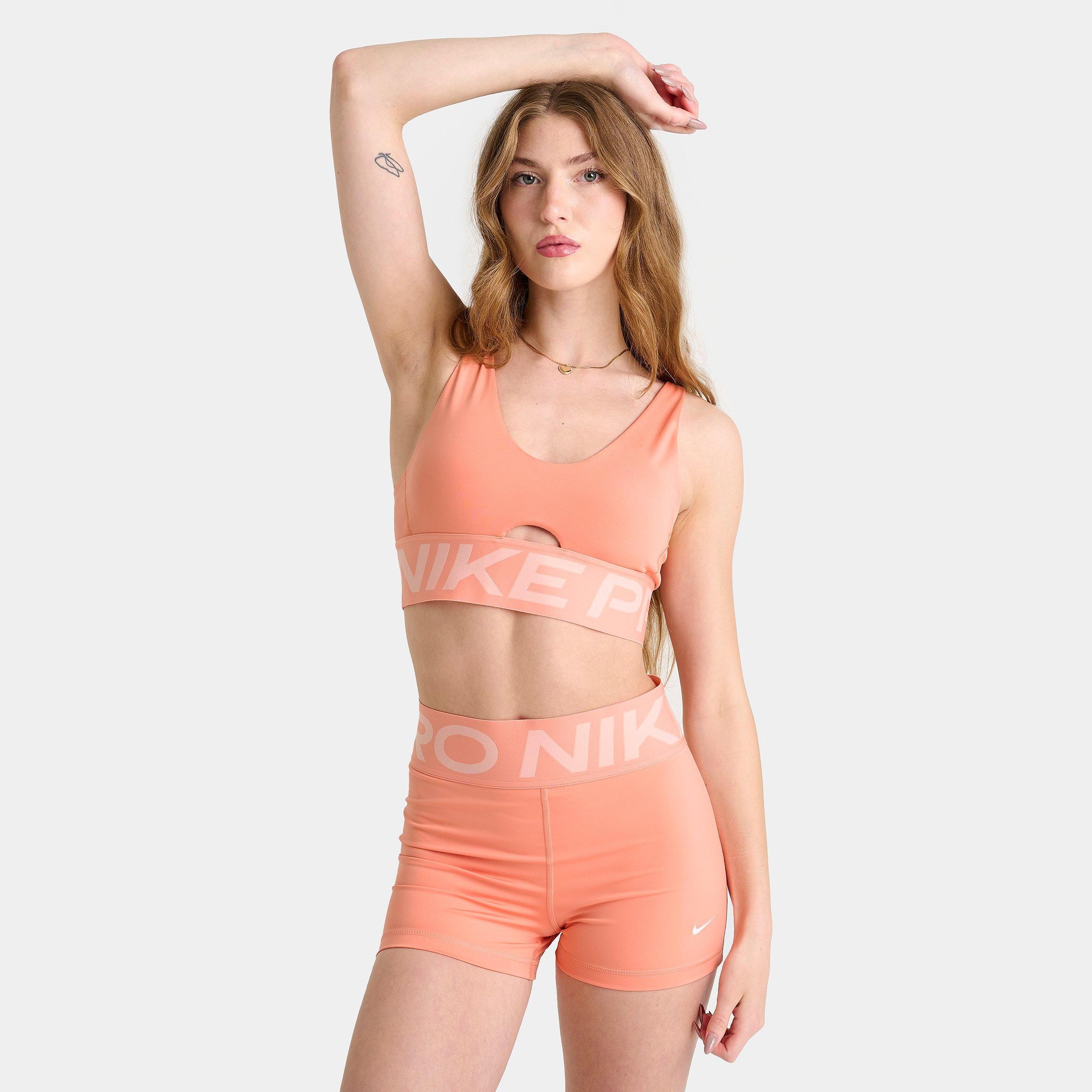Nike Women's Pro Indy Plunge Sports Bra in Apricot Agate/Washed Coral/White Size: XS