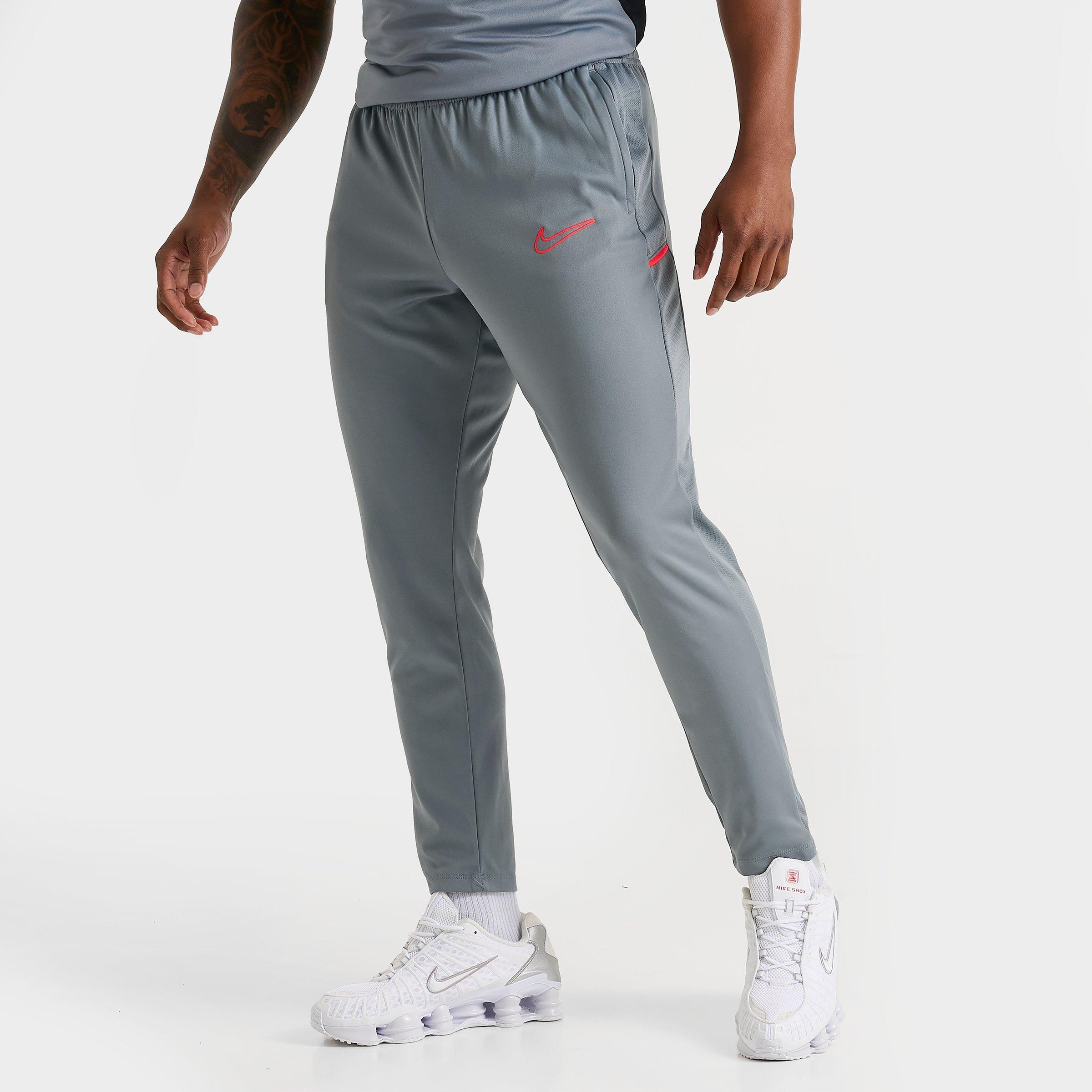 Nike Men's Academy Dri-FIT Knit Soccer Pants in Cool Grey/Cool Grey/Bright Crimson Size: Small