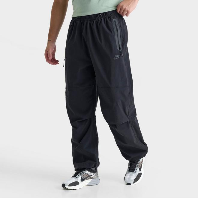 Nike mid 90’s nylon tech pants ワケアリ MENS 28 NIKE SPORTSWEAR TECH WOVEN BONDED JOGGER PANT DARK