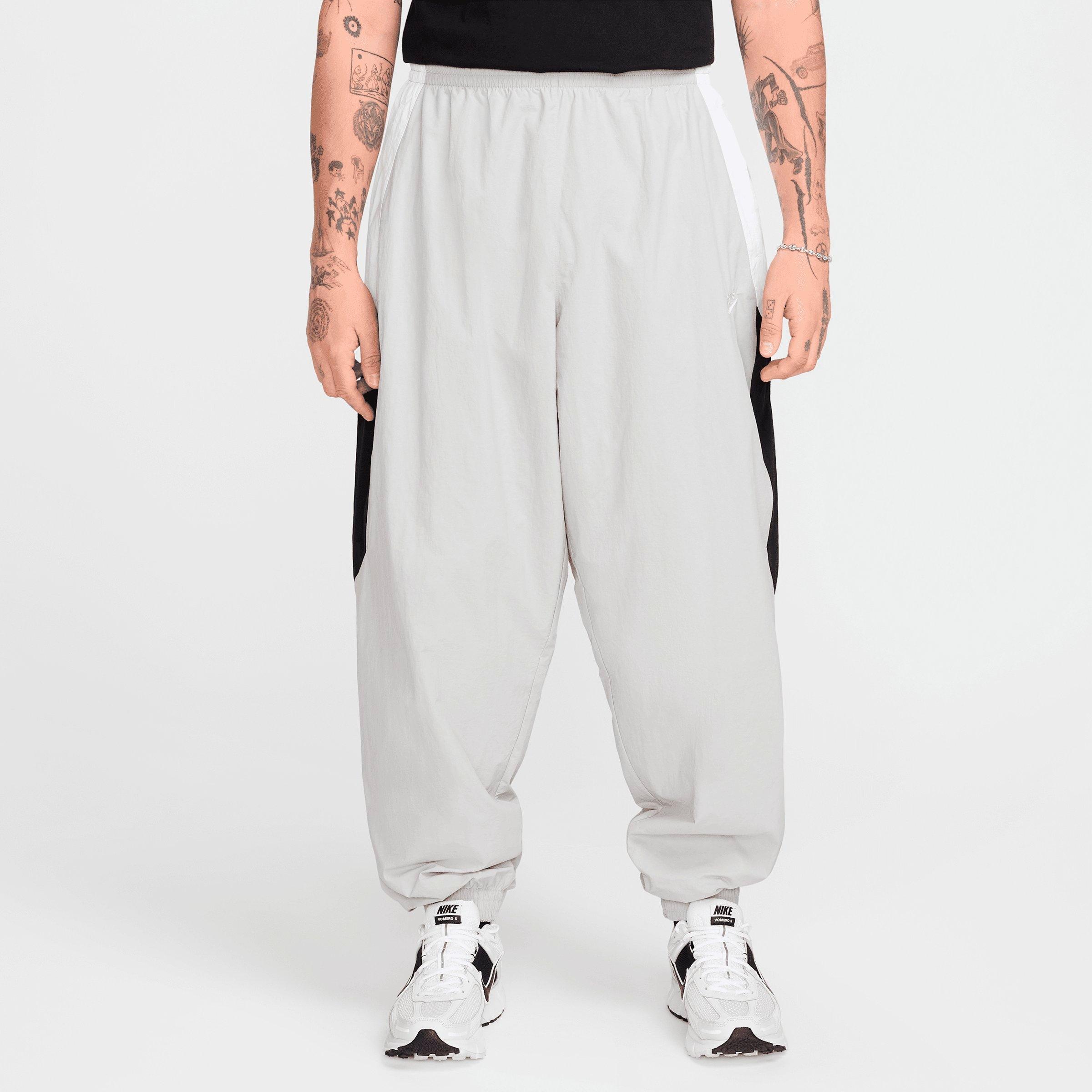 Nike Men's Club Oversized Woven Track Pants in Light Smoke Grey/White/Black Size: XS