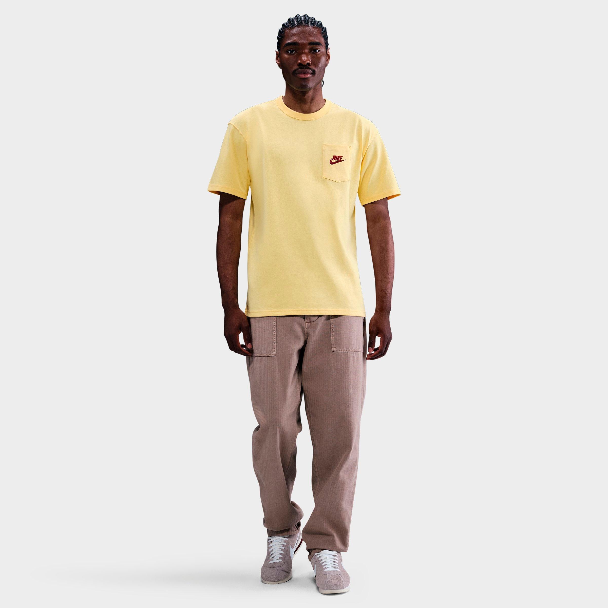 Nike Men's Sportswear Premium Essentials Pocket T-Shirt in Soft Yellow Size: XS