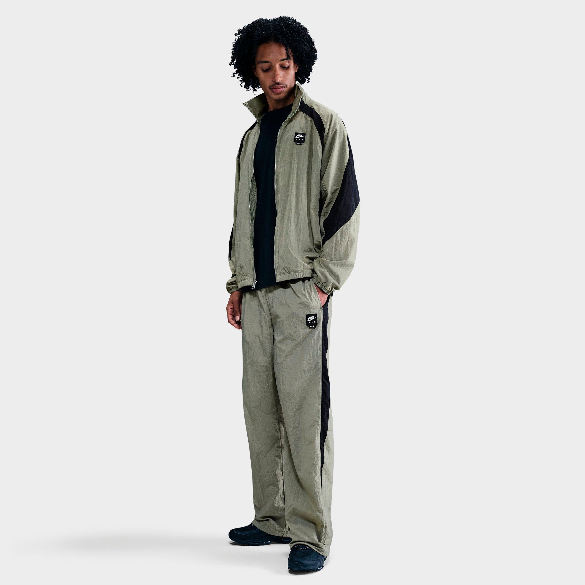 Nike Men's Air Woven Track Pants in Light Army/Black Size: XS