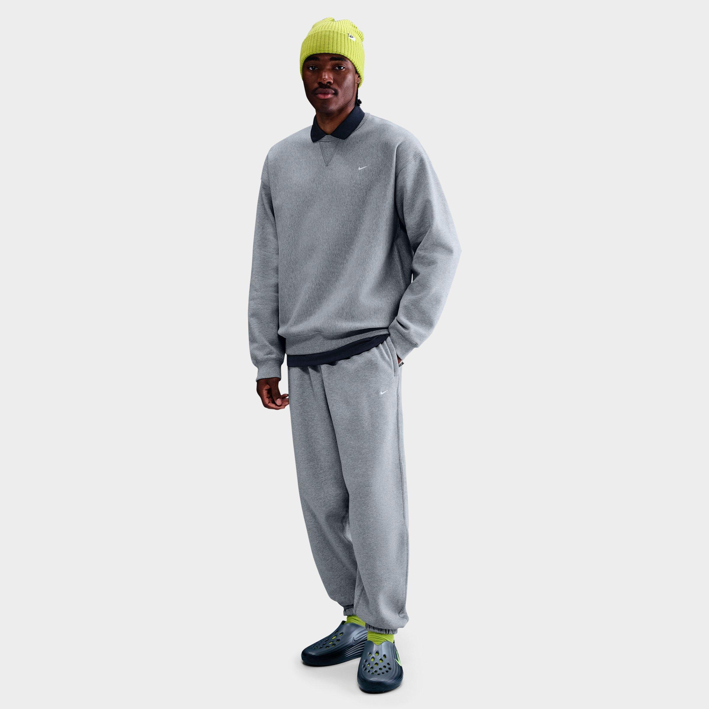 Nike Men's Solo Swoosh Cuffed Fleece Pants in Dark Grey Heather/Light Smoke Grey/White Size: XS