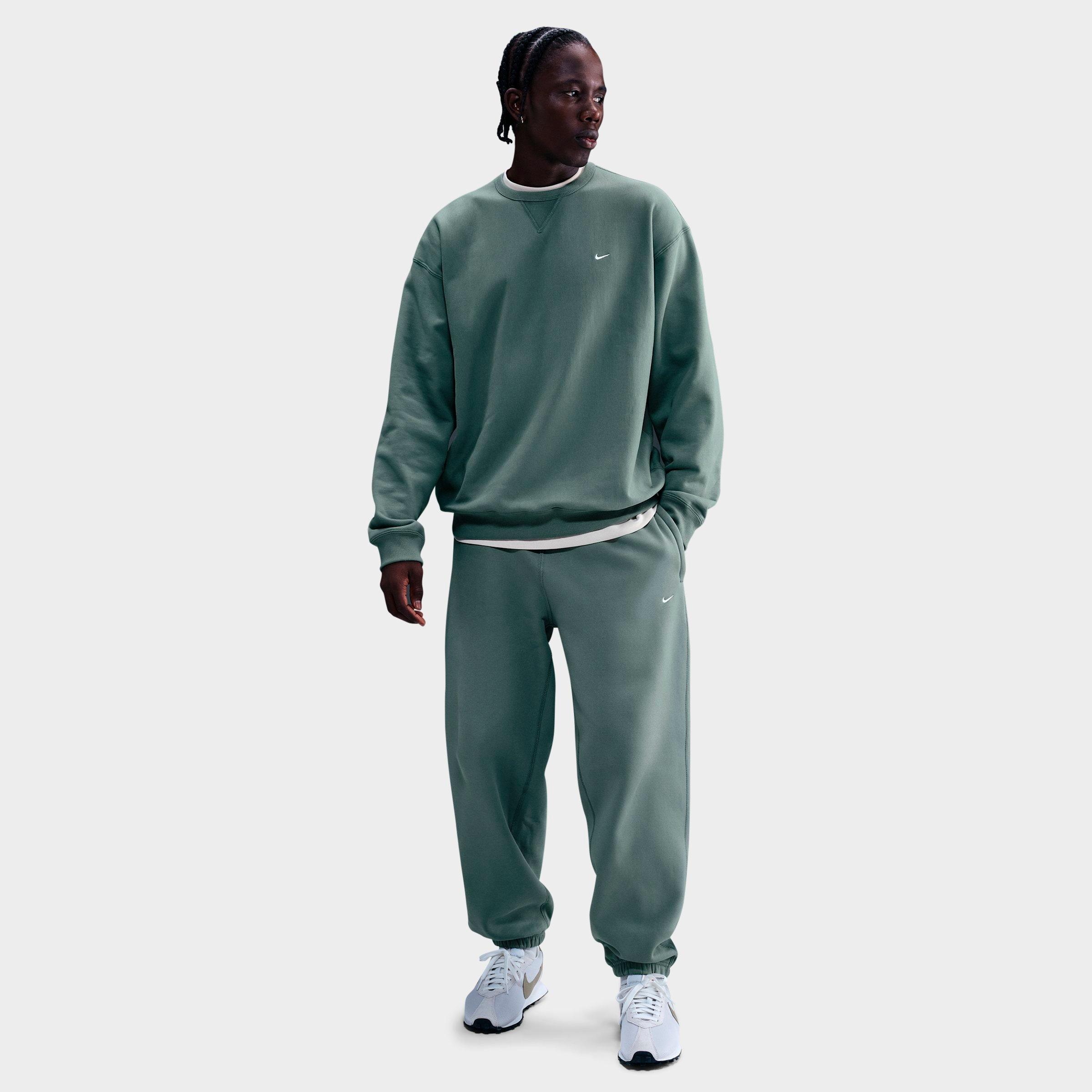 Nike Men's Solo Swoosh Cuffed Fleece Pants In Green