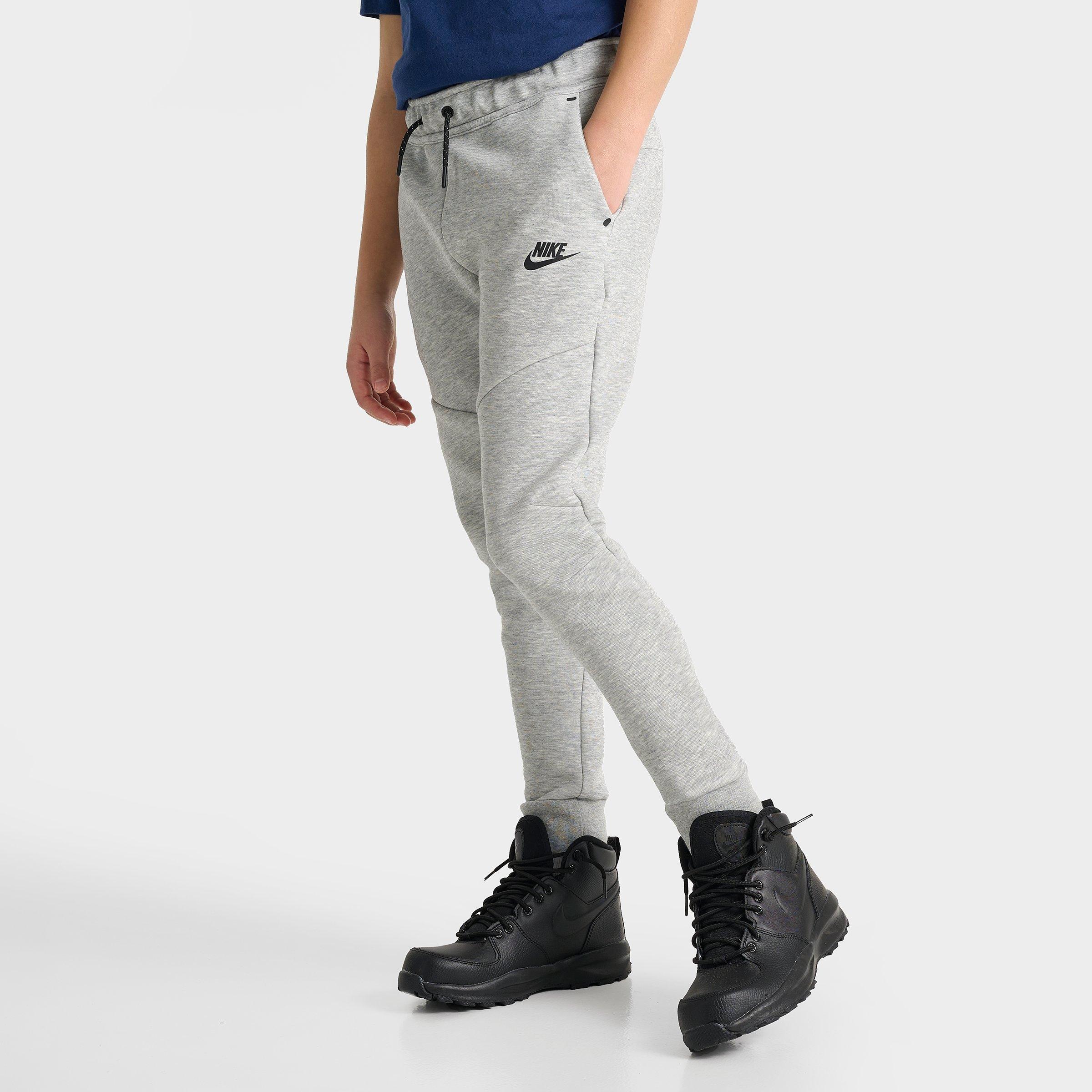 Nike Big Kids Sportswear Tech Fleece Reflective Jogger Pants in Dark Grey Heather/Black Size: Small