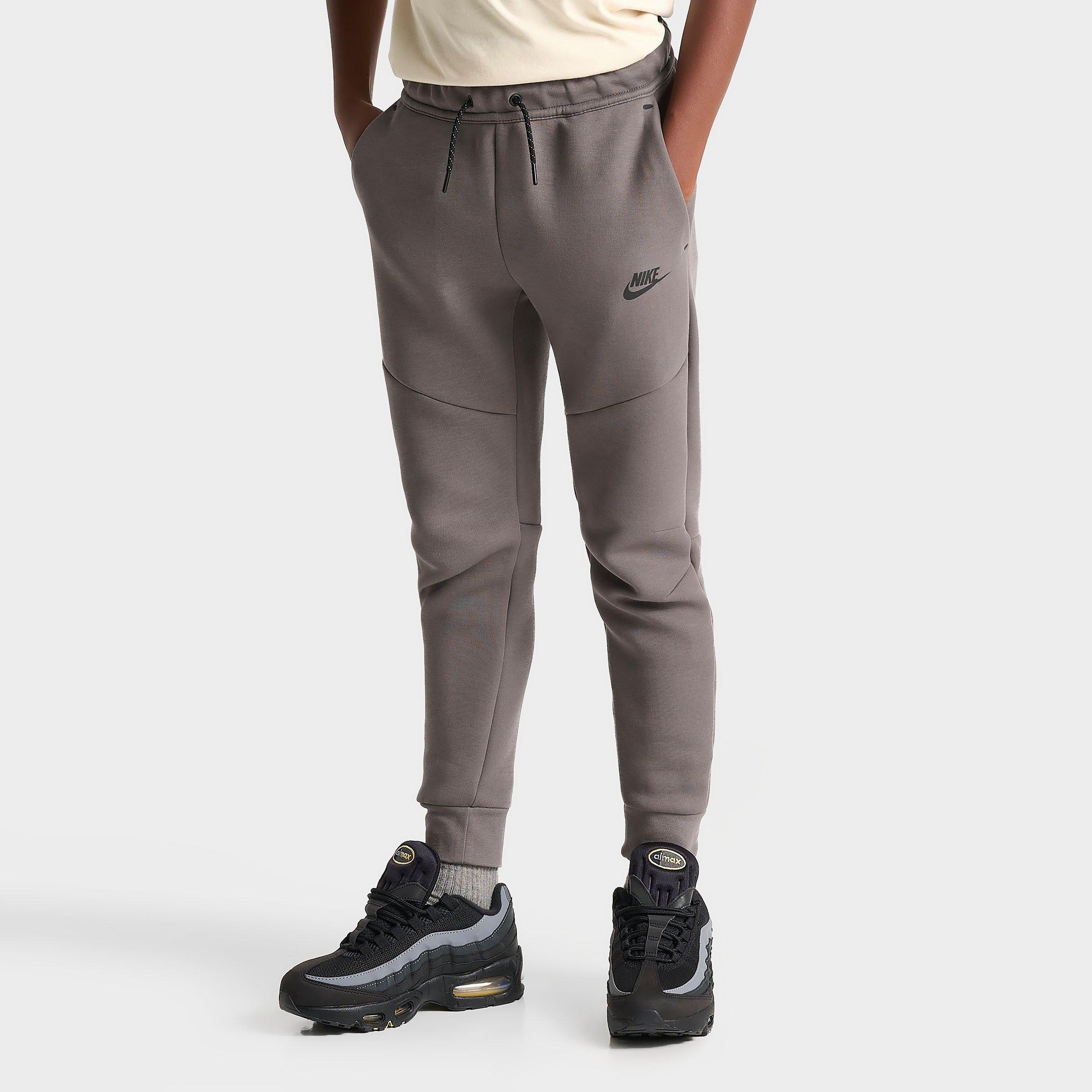Nike Big Kids Sportswear Tech Fleece Reflective Jogger Pants in Cave Stone Size: Small