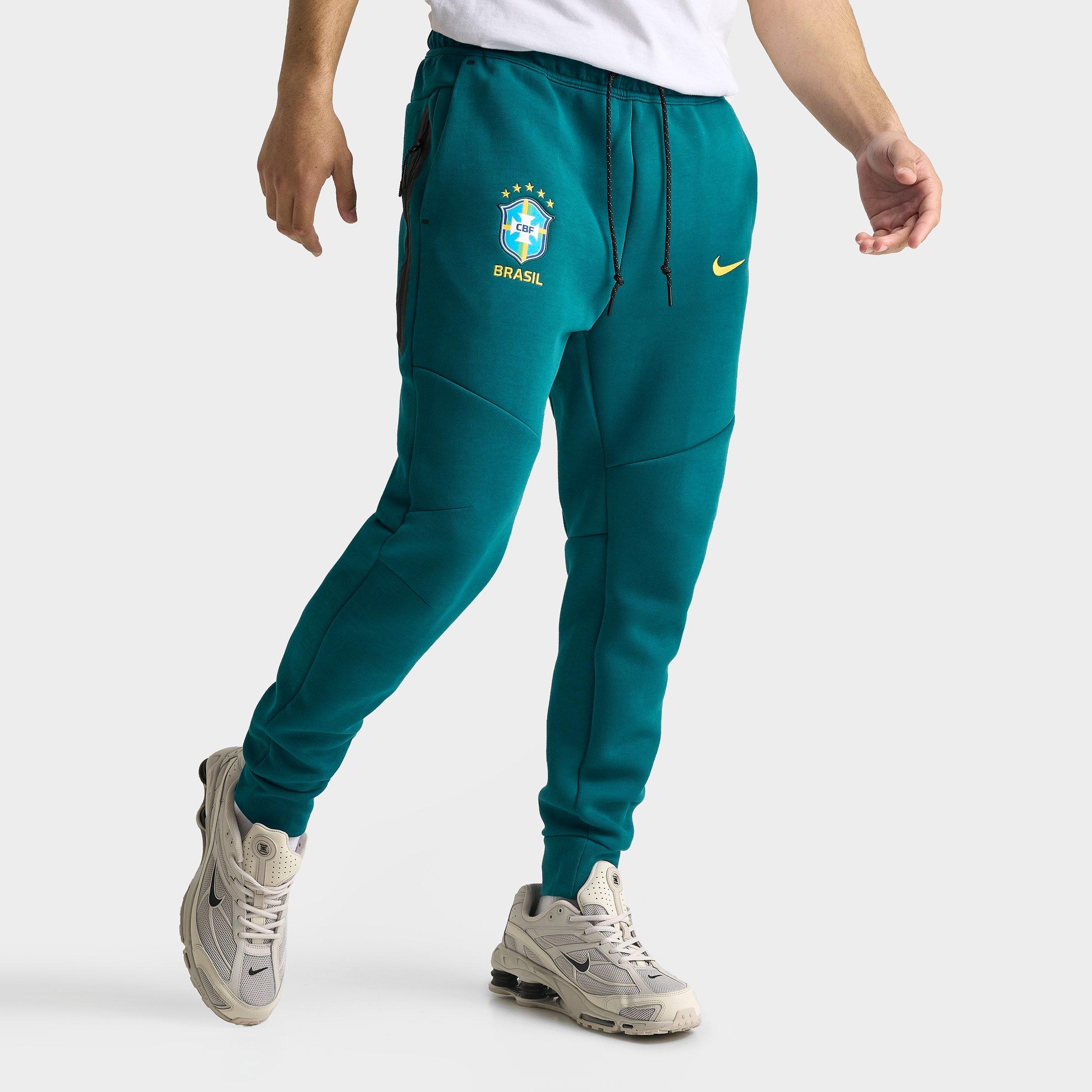 Nike Men's Brazil Soccer Tech Fleece Jogger Pants in Geode Teal/Midwest Gold Size: Small