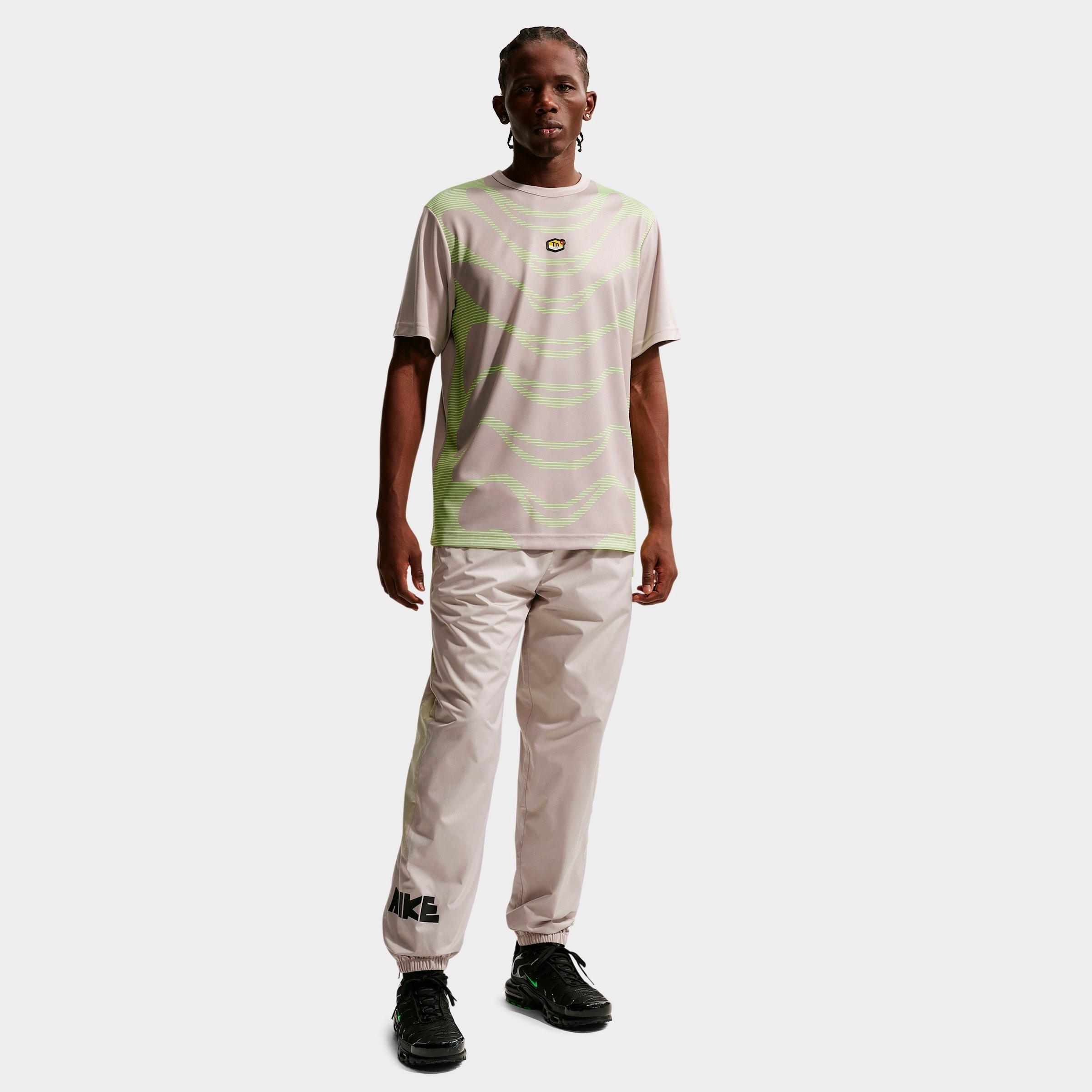 Nike Men's Windrunner Graphic Woven Pants in Moon Particle/Cream II/Volt Size: XS