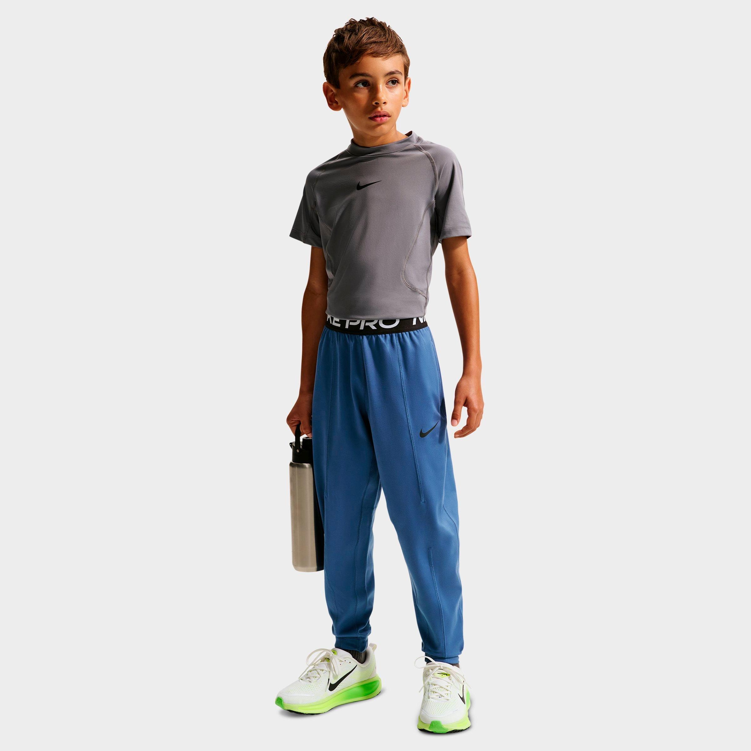 Nike Big Kids Pro Dri-FIT Fleece Jogger Pants in Mystic Navy/White/Black Size: Medium